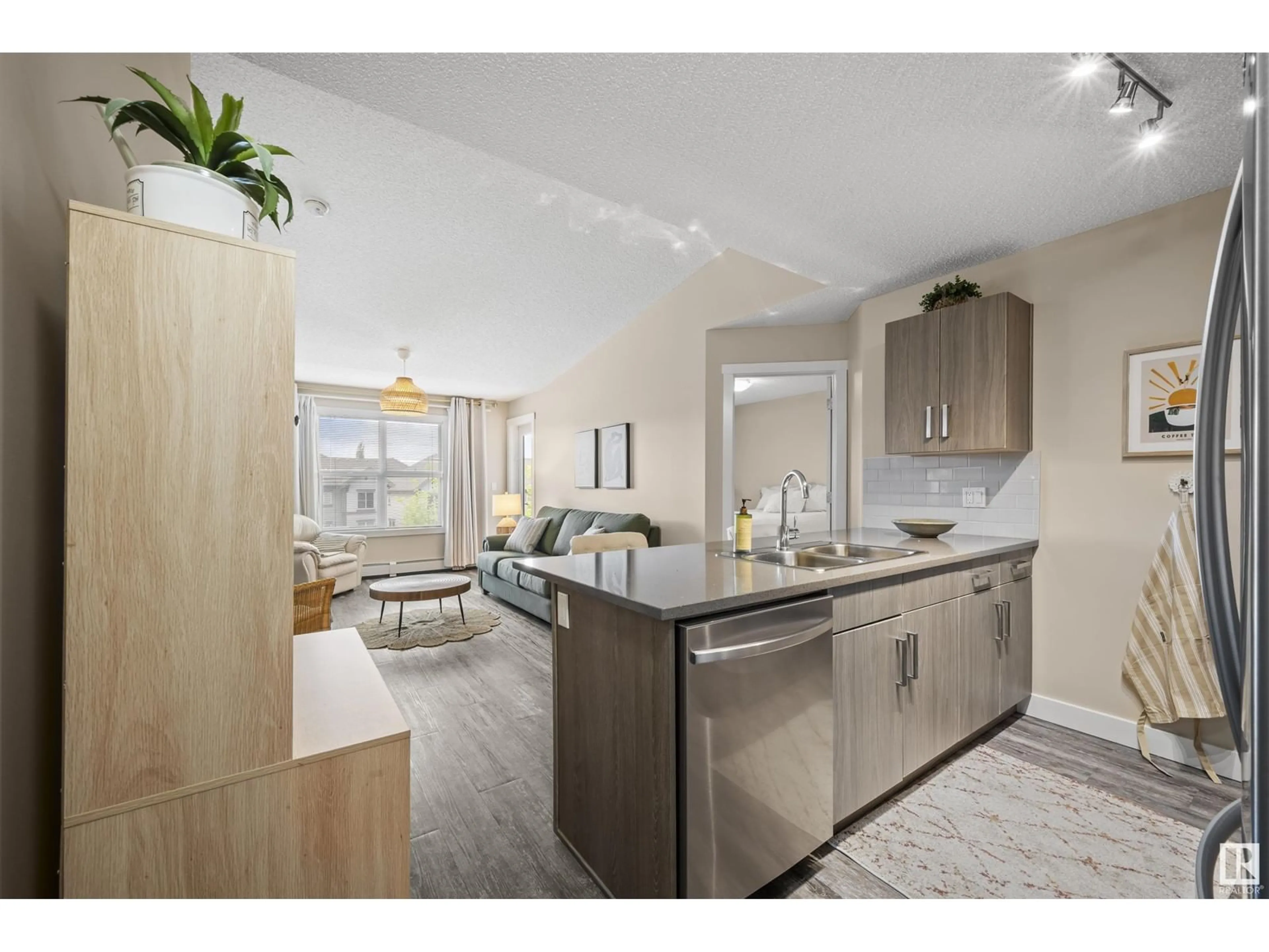 Open concept kitchen, unknown for #416 - 667 WATT BV, Edmonton Alberta T6X0Y2