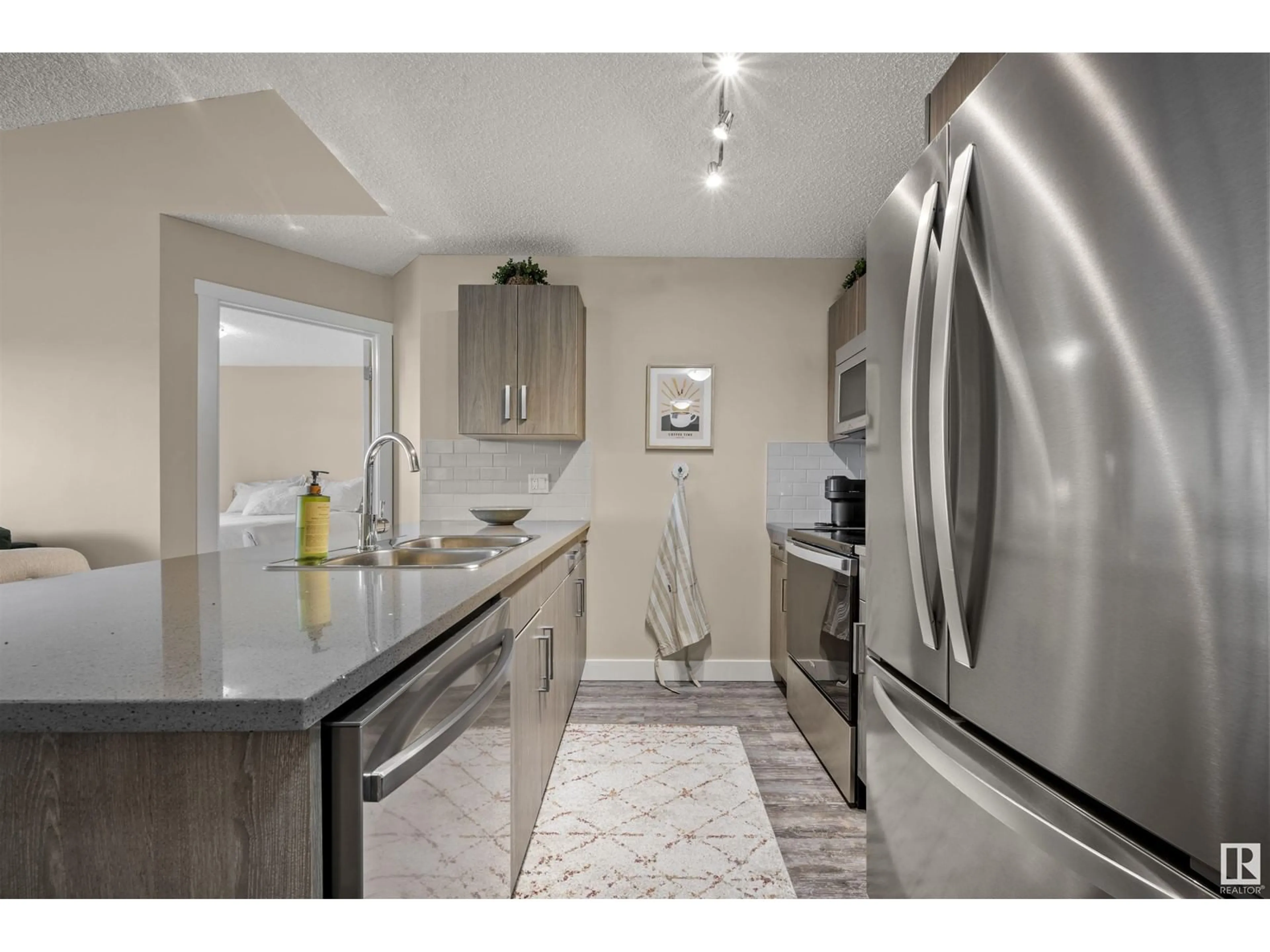 Open concept kitchen, unknown for #416 - 667 WATT BV, Edmonton Alberta T6X0Y2