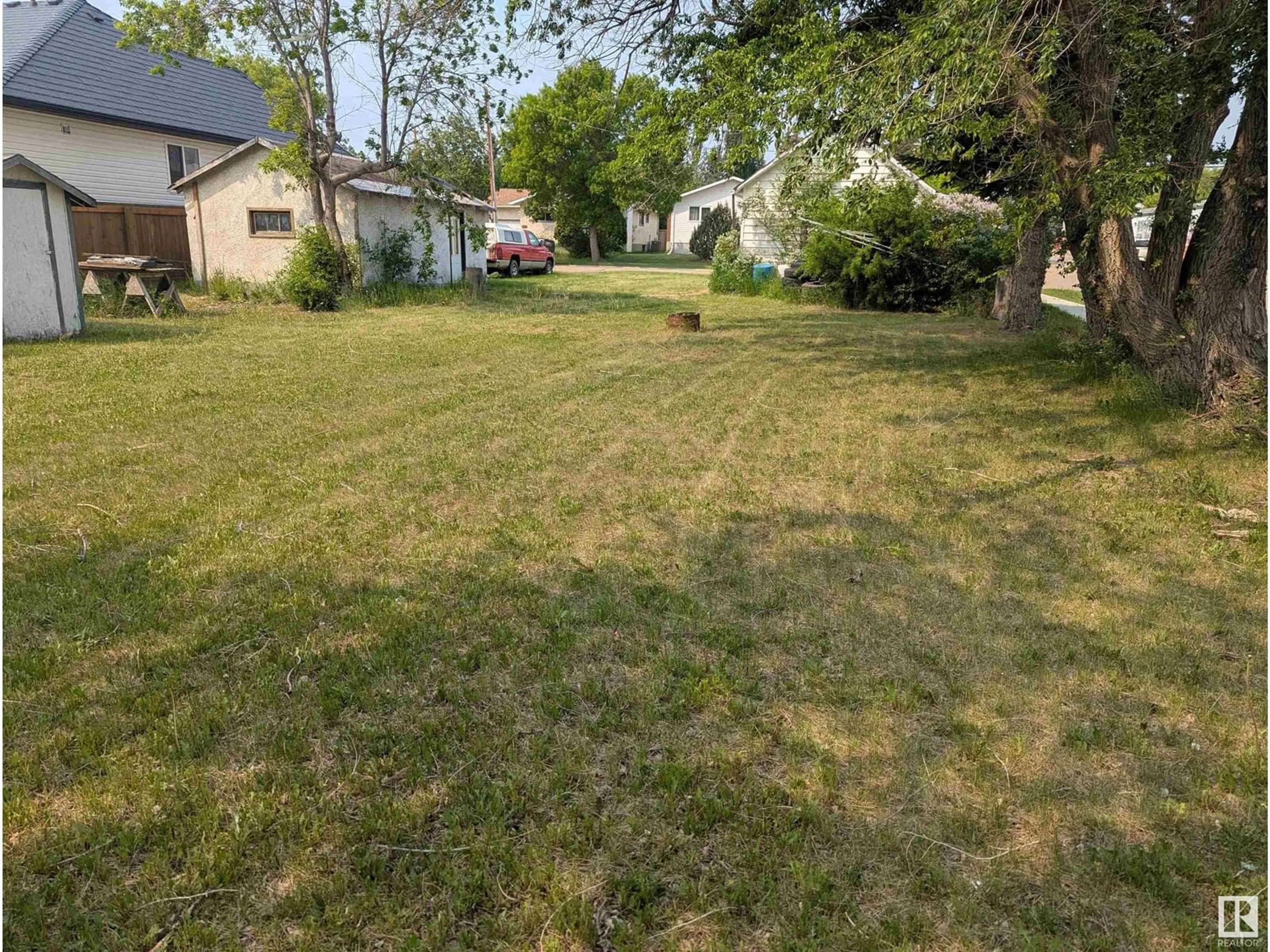 A pic from outside/outdoor area/front of a property/back of a property/a pic from drone, street for 5027 47 ST, Legal Alberta T0G1L0