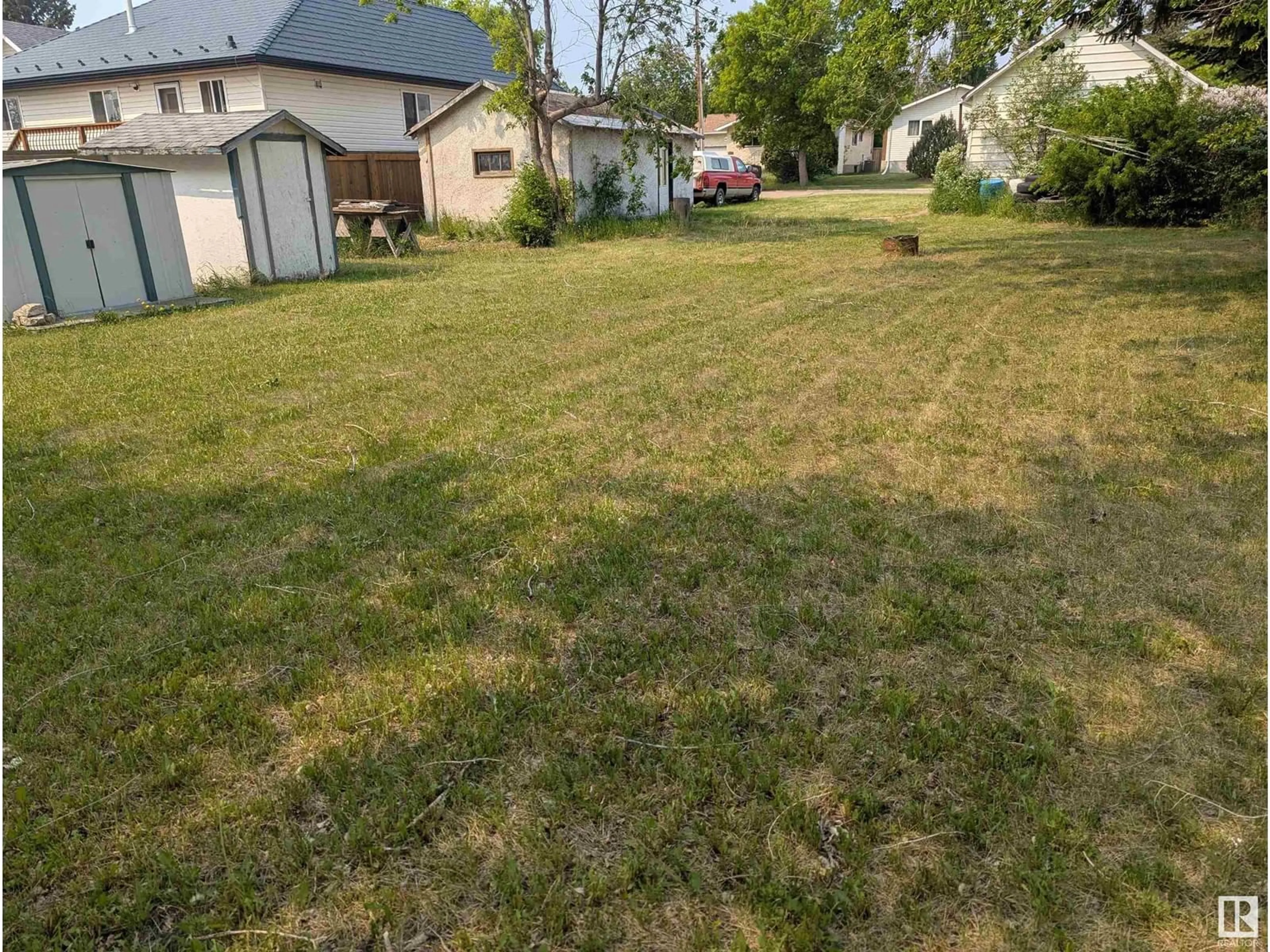 A pic from outside/outdoor area/front of a property/back of a property/a pic from drone, street for 5027 47 ST, Legal Alberta T0G1L0