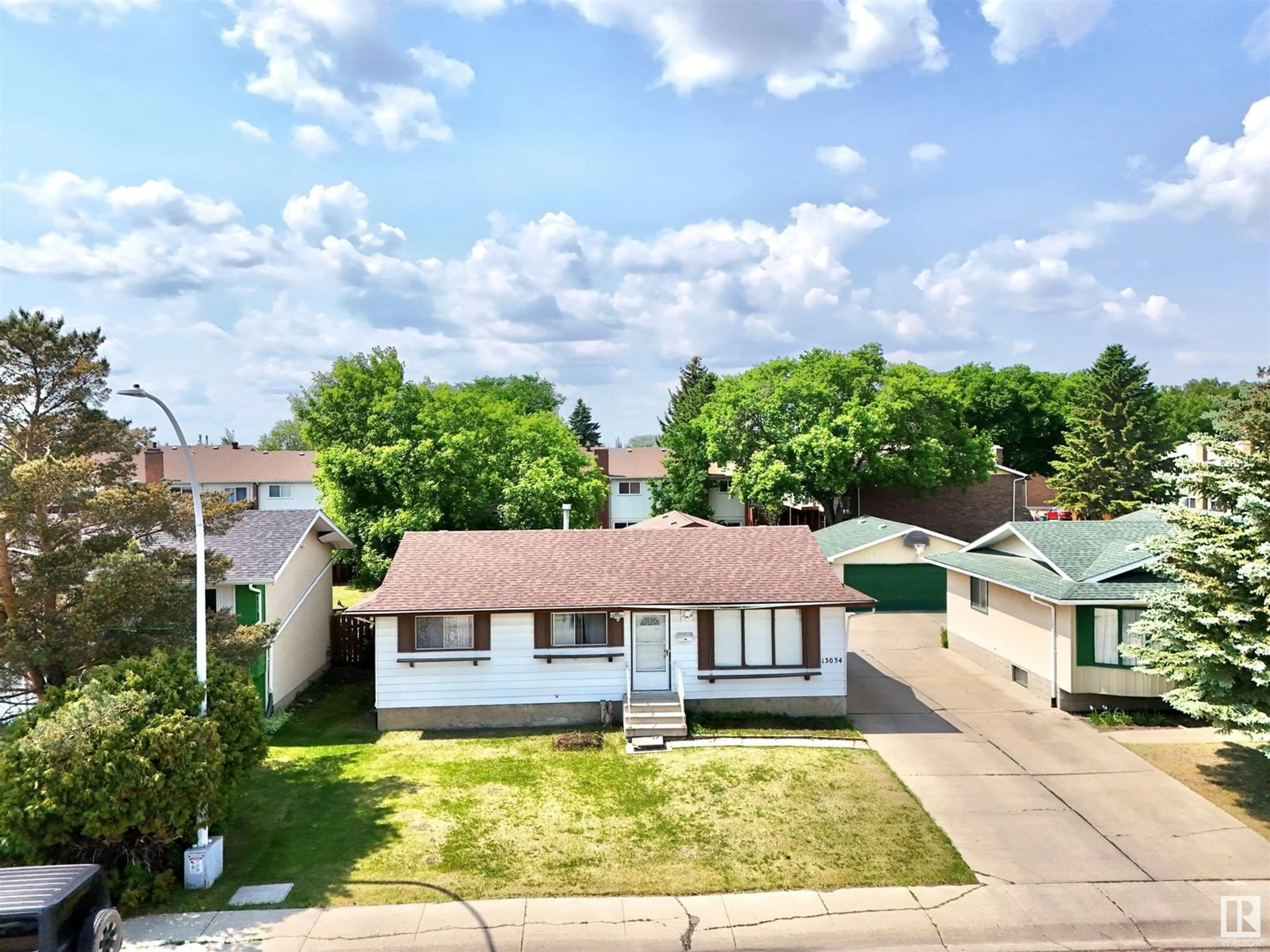 A pic from outside/outdoor area/front of a property/back of a property/a pic from drone, street for NW - 13034 32A ST, Edmonton Alberta T5A3E5