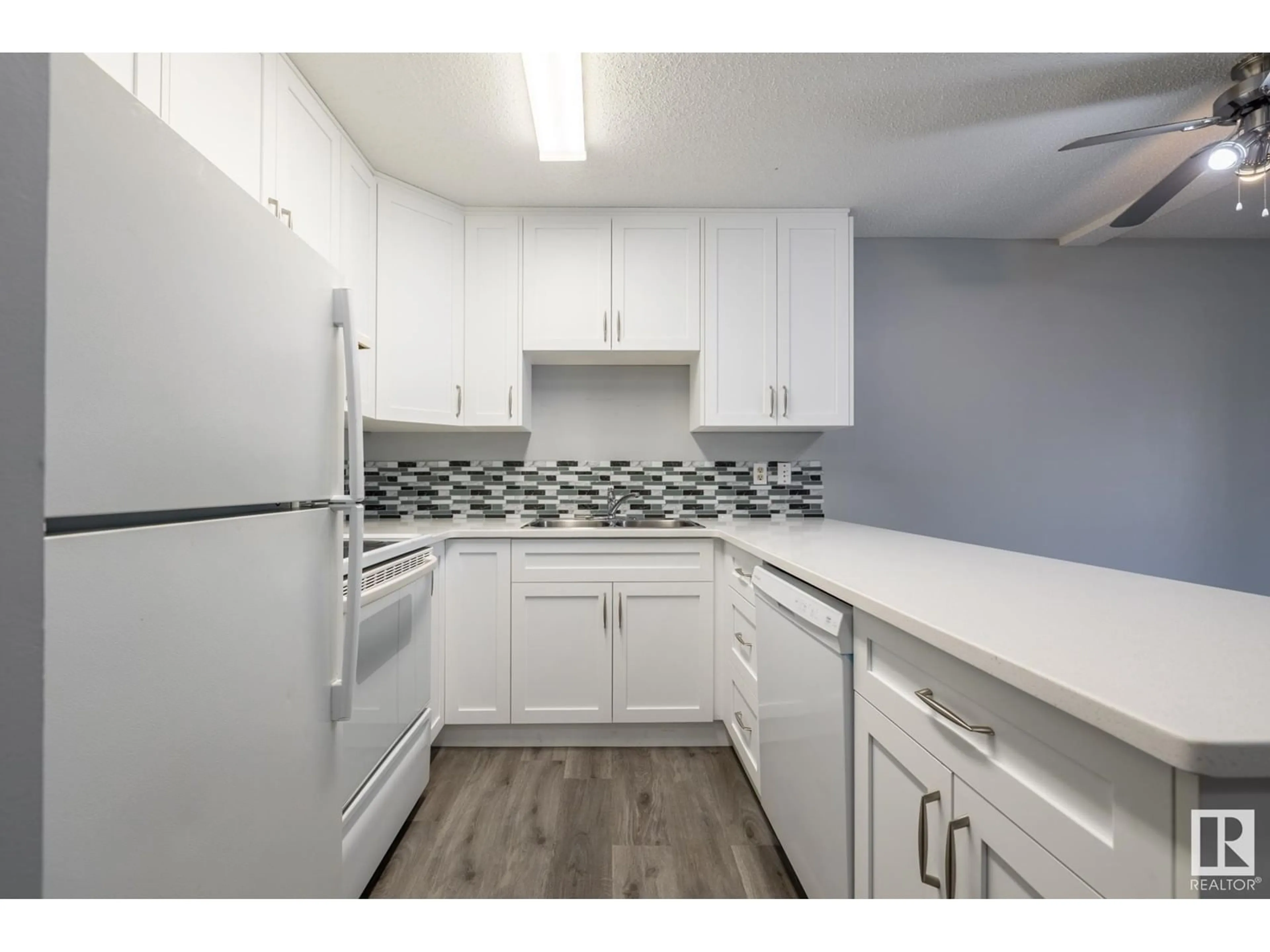 Standard kitchen, unknown for #103 - 3404 18 AV, Edmonton Alberta T6L3C2