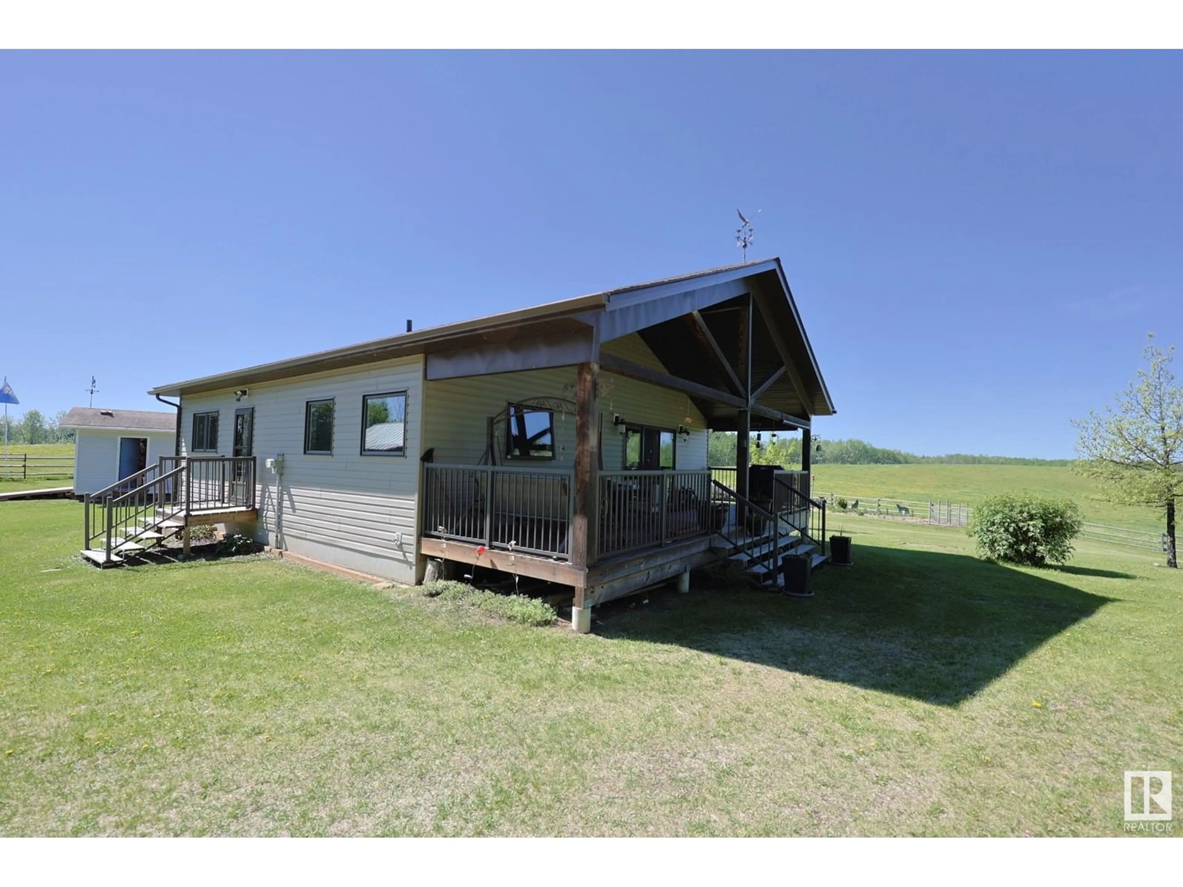 A pic from outside/outdoor area/front of a property/back of a property/a pic from drone, building for 240002 TWP RD 674, Rural Athabasca County Alberta T0S0A1