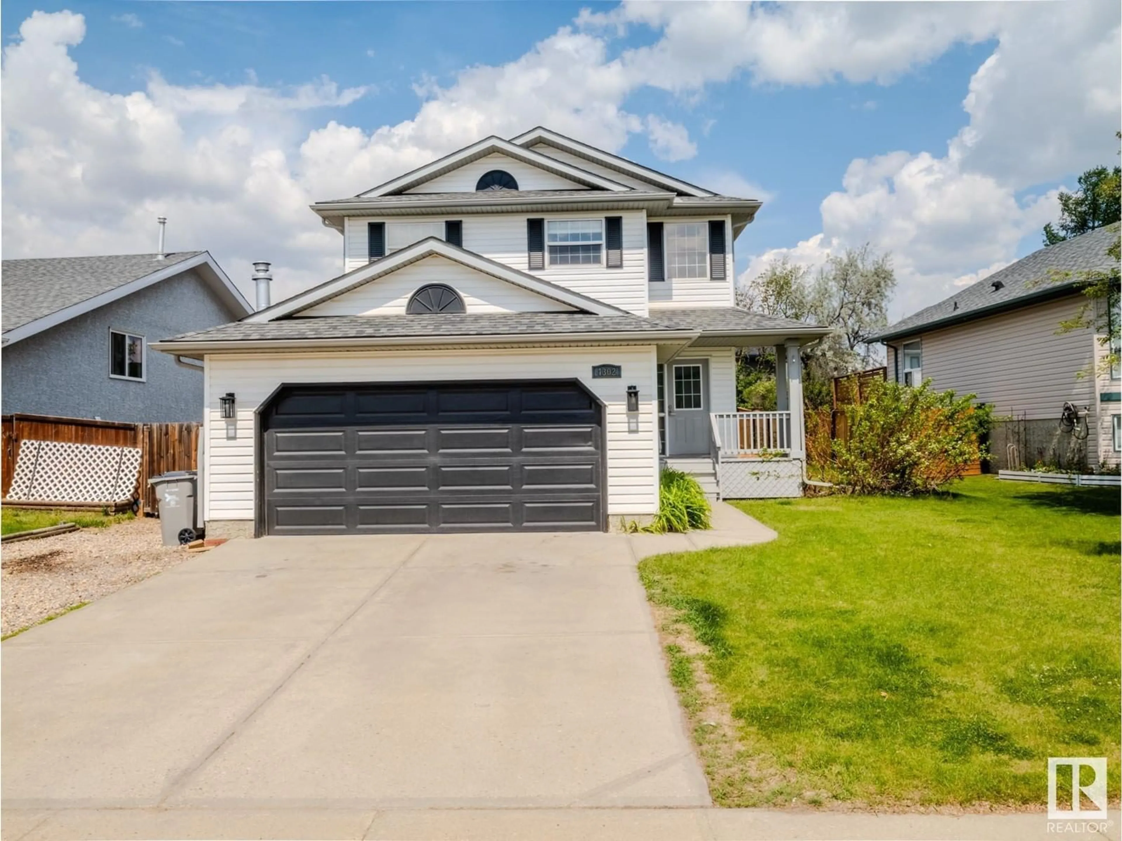 Home with vinyl exterior material, street for 4302 43 AV, Beaumont Alberta T4X1M5