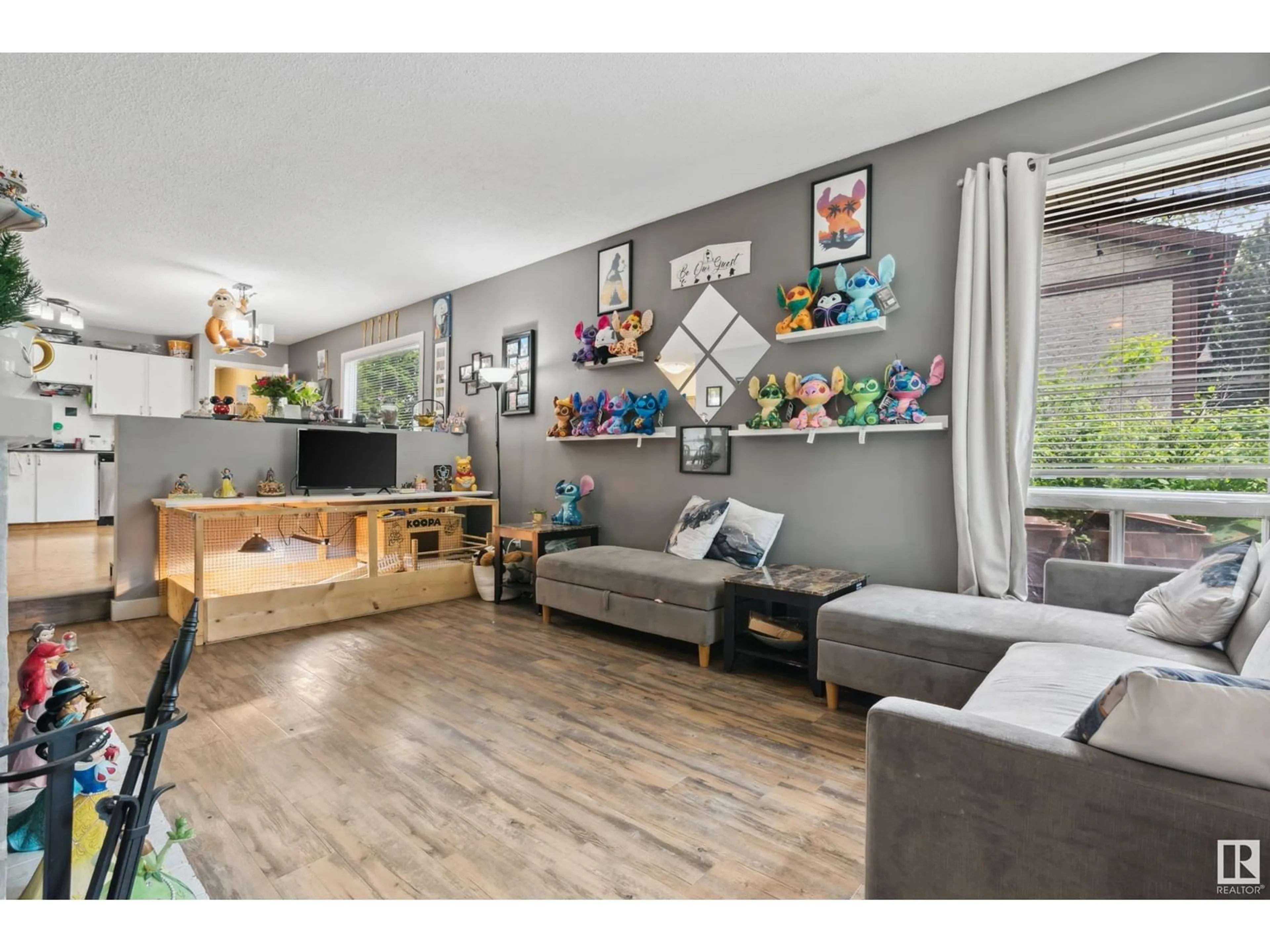 Living room with furniture, wood/laminate floor for 16 GARETH PL, St. Albert Alberta T8N3K5