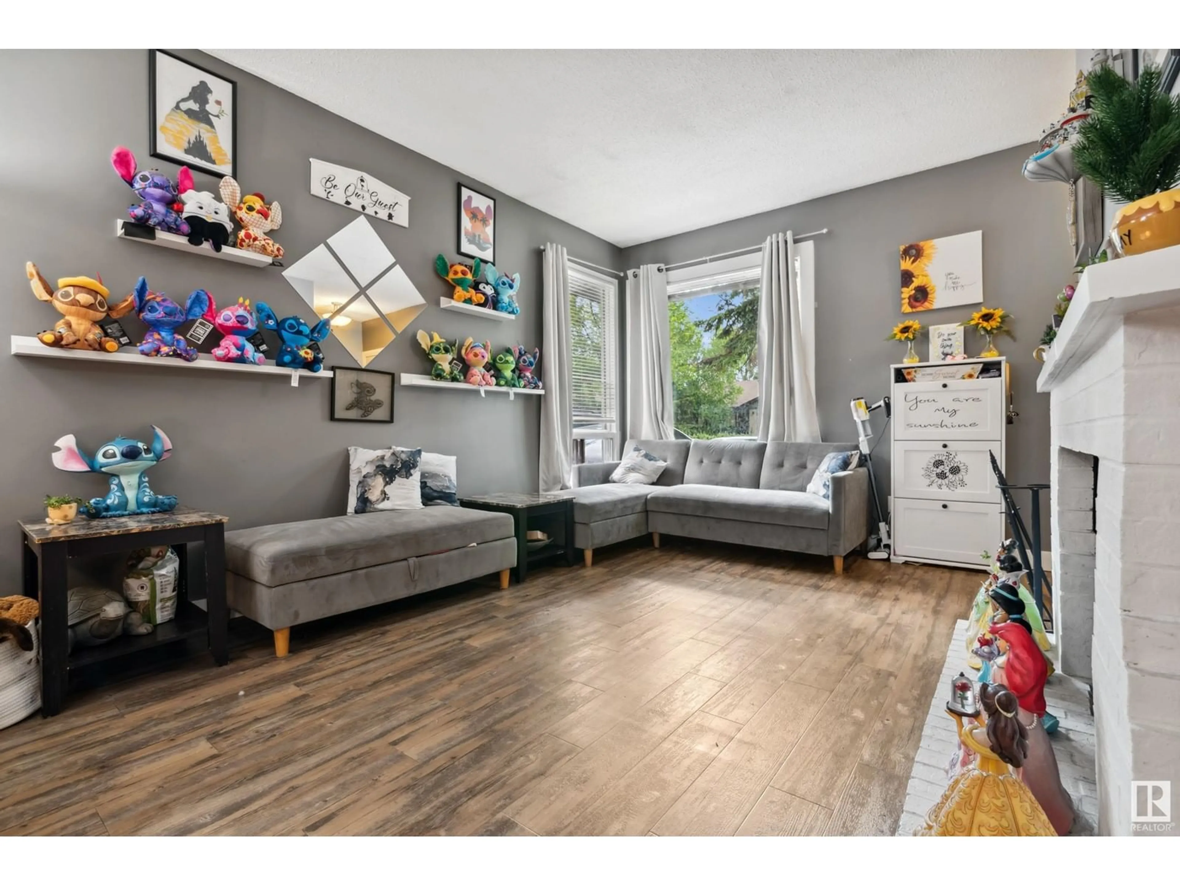 Living room with furniture, wood/laminate floor for 16 GARETH PL, St. Albert Alberta T8N3K5