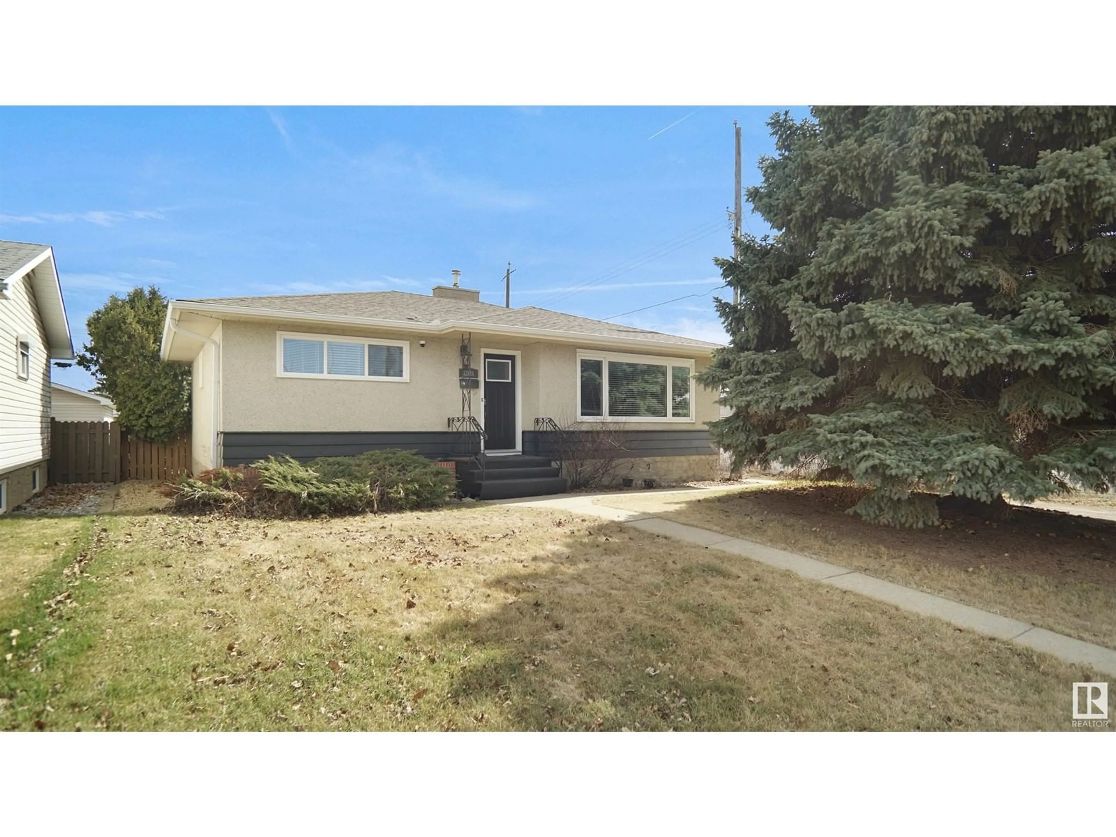 Home with vinyl exterior material, street for NW - 12815 79 ST, Edmonton Alberta T5C1J1
