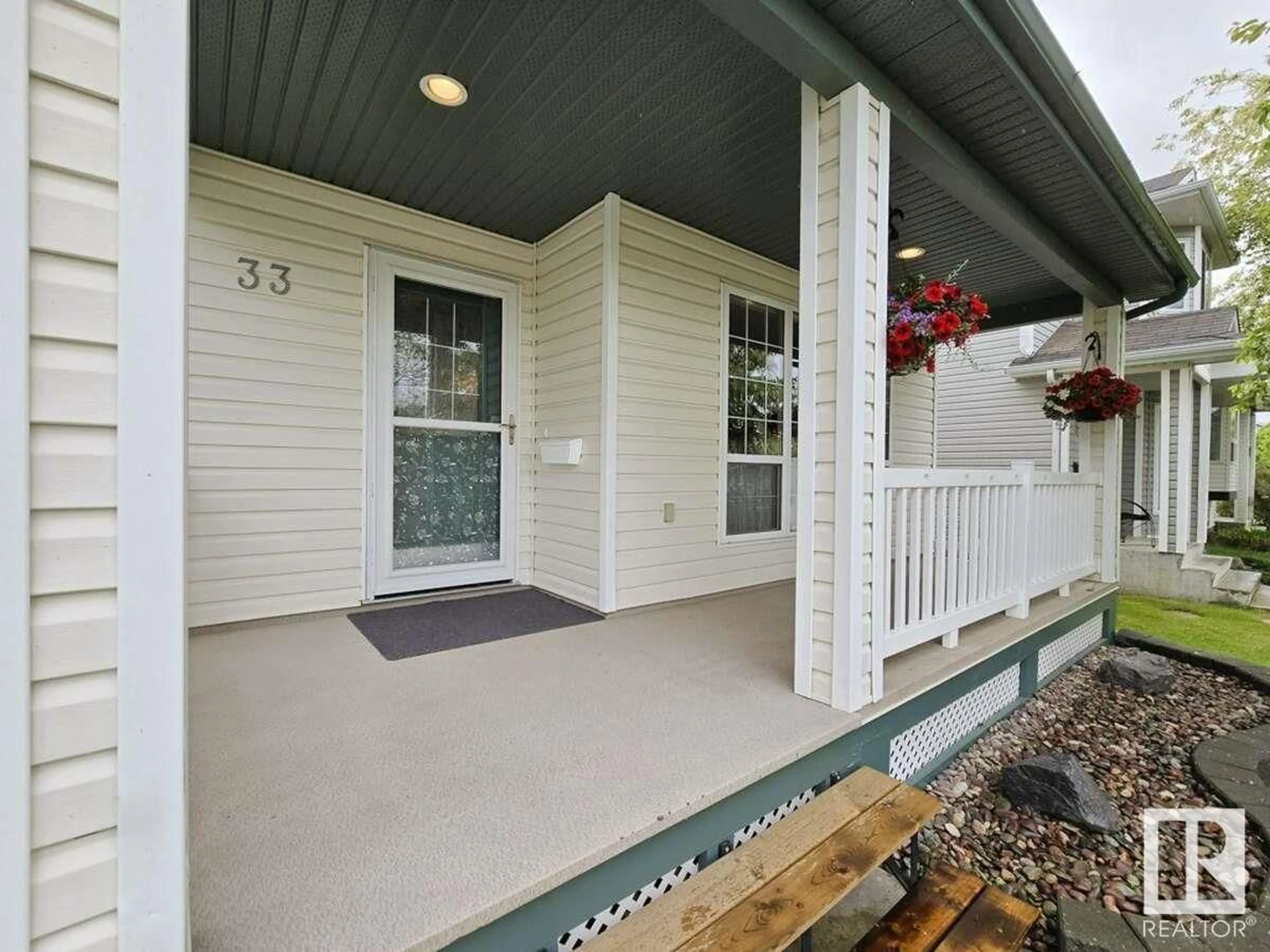 Home with vinyl exterior material, street for 33 HIGHWOOD BV, Devon Alberta T9G2E7