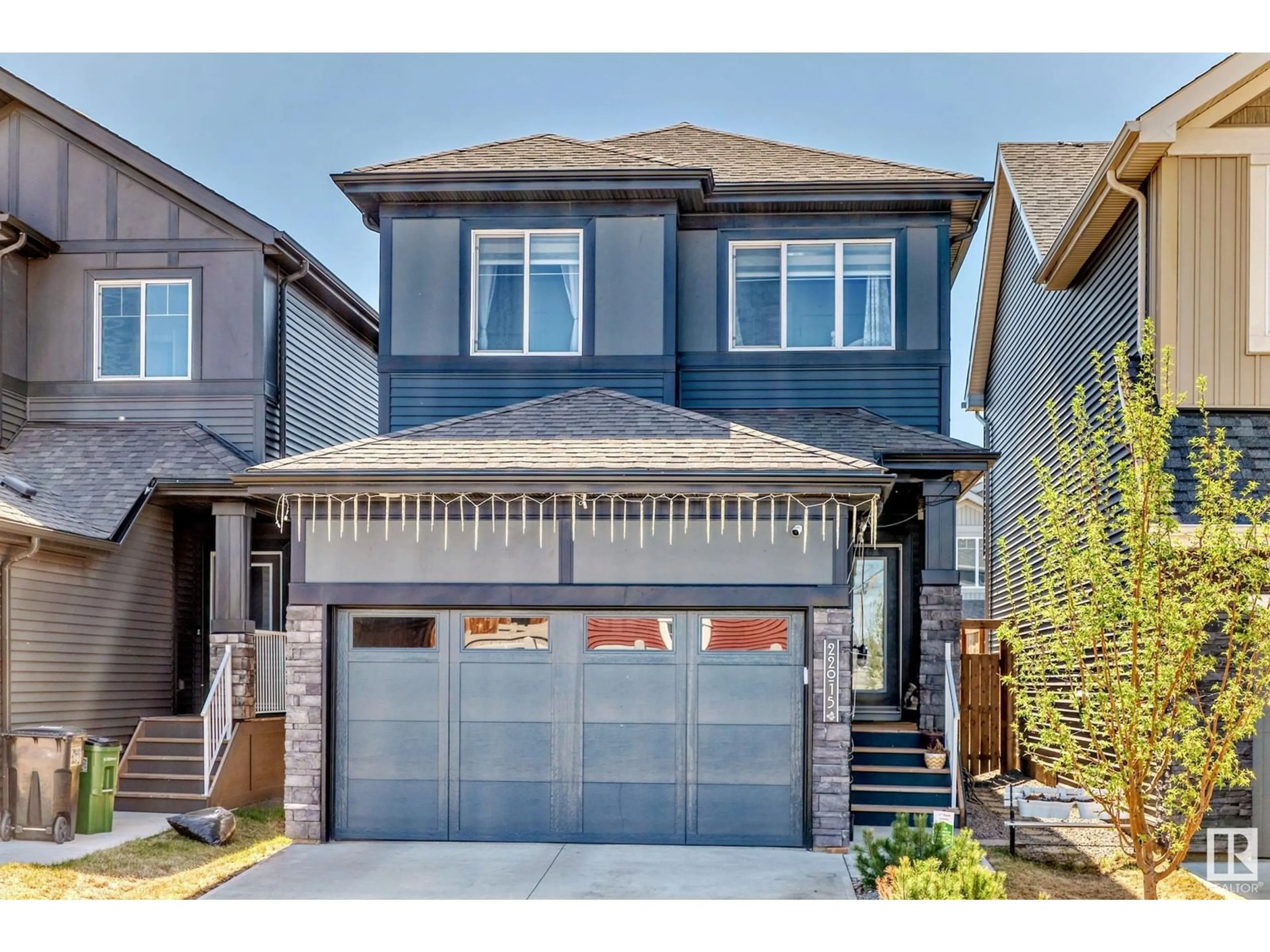 Home with vinyl exterior material, street for 22015 85 AVENUE NW, Edmonton Alberta T5T7E4