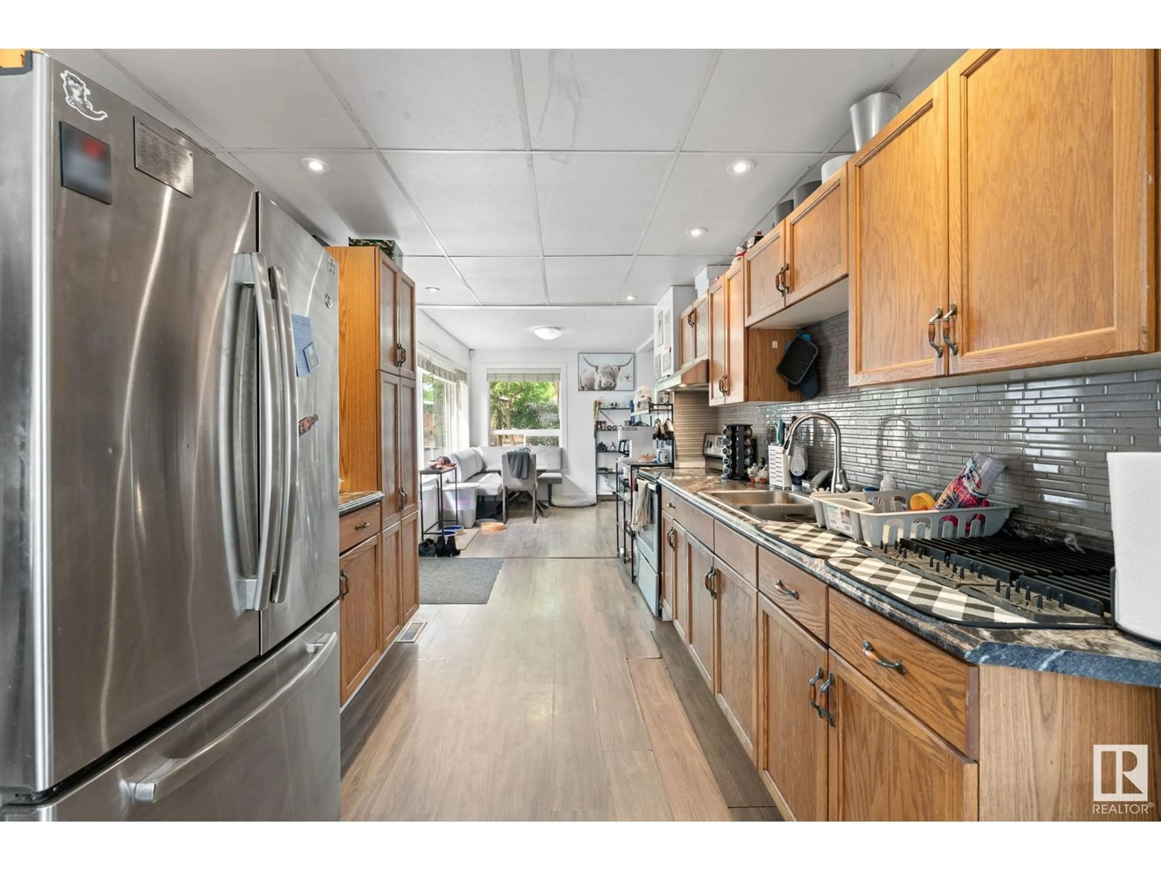Open concept kitchen, unknown for 11817 44 ST, Edmonton Alberta T5W2S4