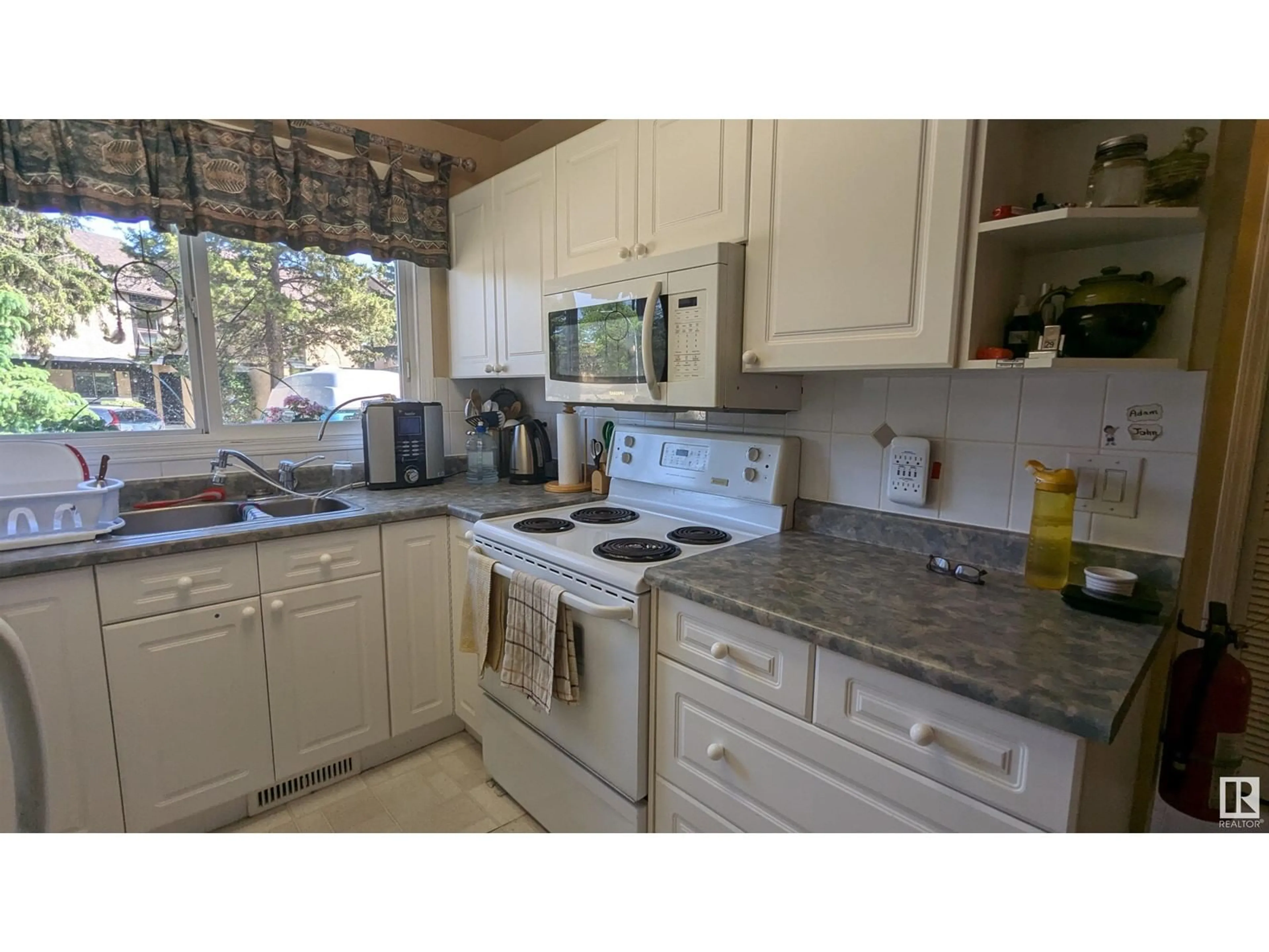 Standard kitchen, ceramic/tile floor for 12138 25 AV, Edmonton Alberta T6J4L4