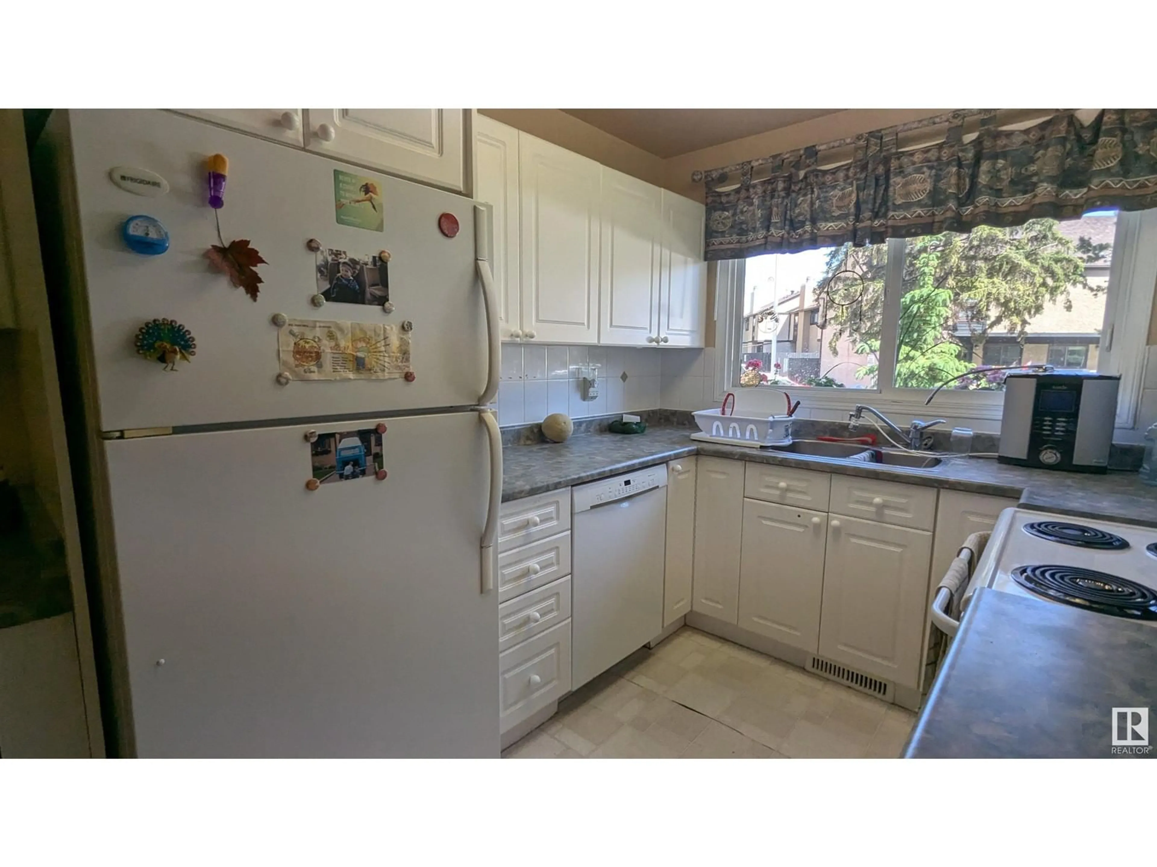 Standard kitchen, ceramic/tile floor for 12138 25 AV, Edmonton Alberta T6J4L4