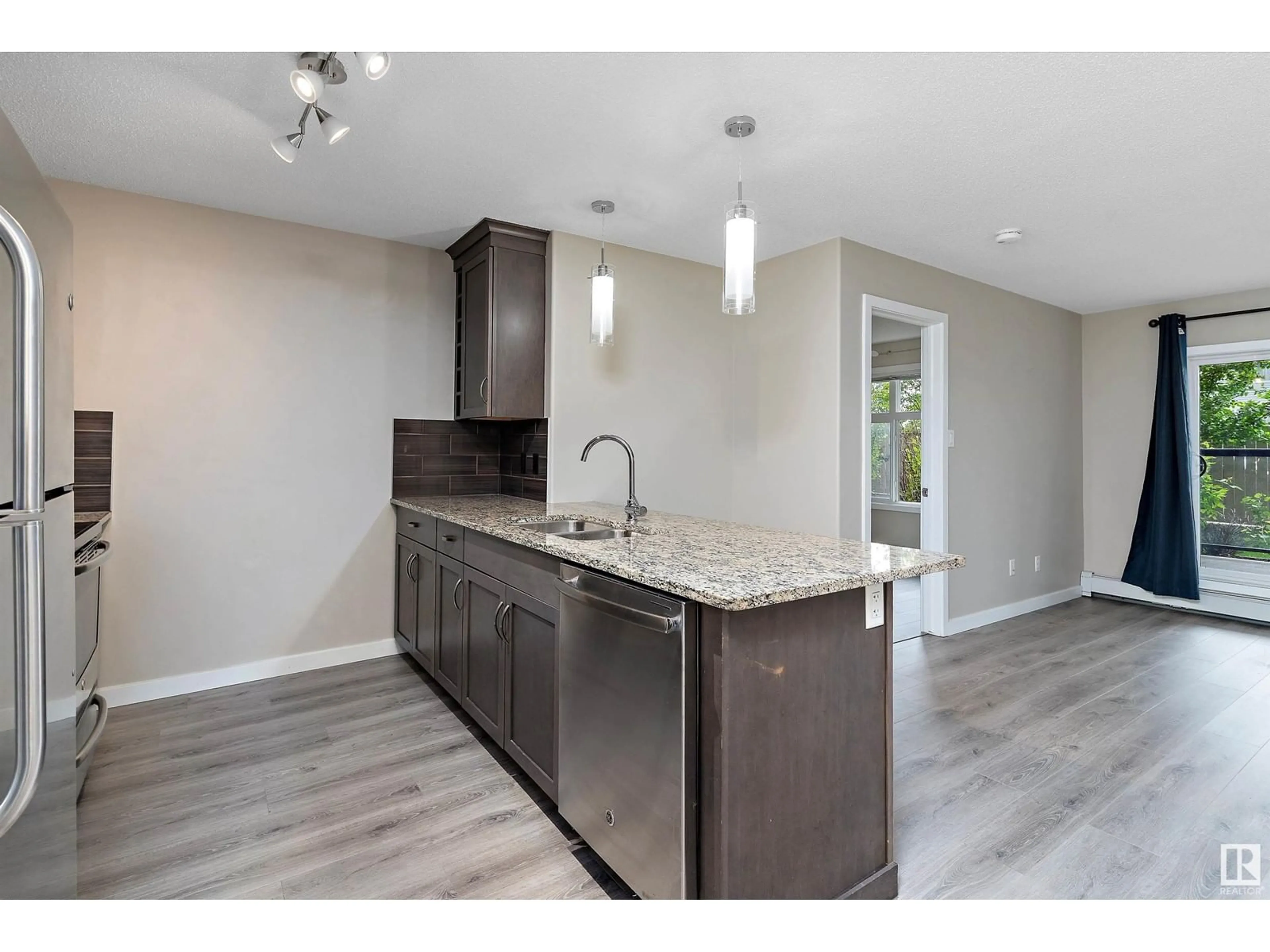 Open concept kitchen, unknown for #153 - 7805 71 ST, Edmonton Alberta T6B3V6