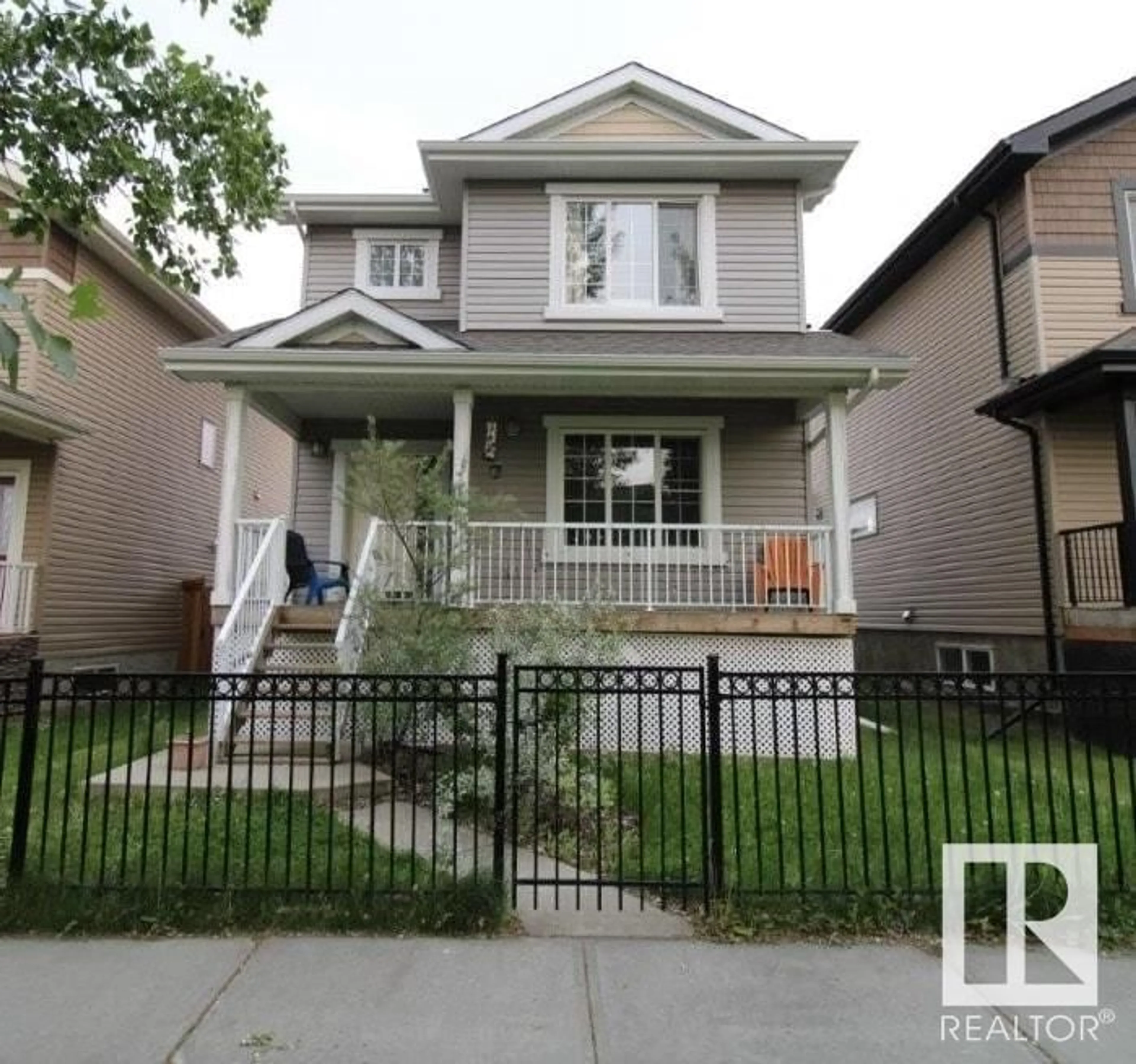 Home with vinyl exterior material, street for 72 STRAWBERRY LN, Leduc Alberta T9E8R6