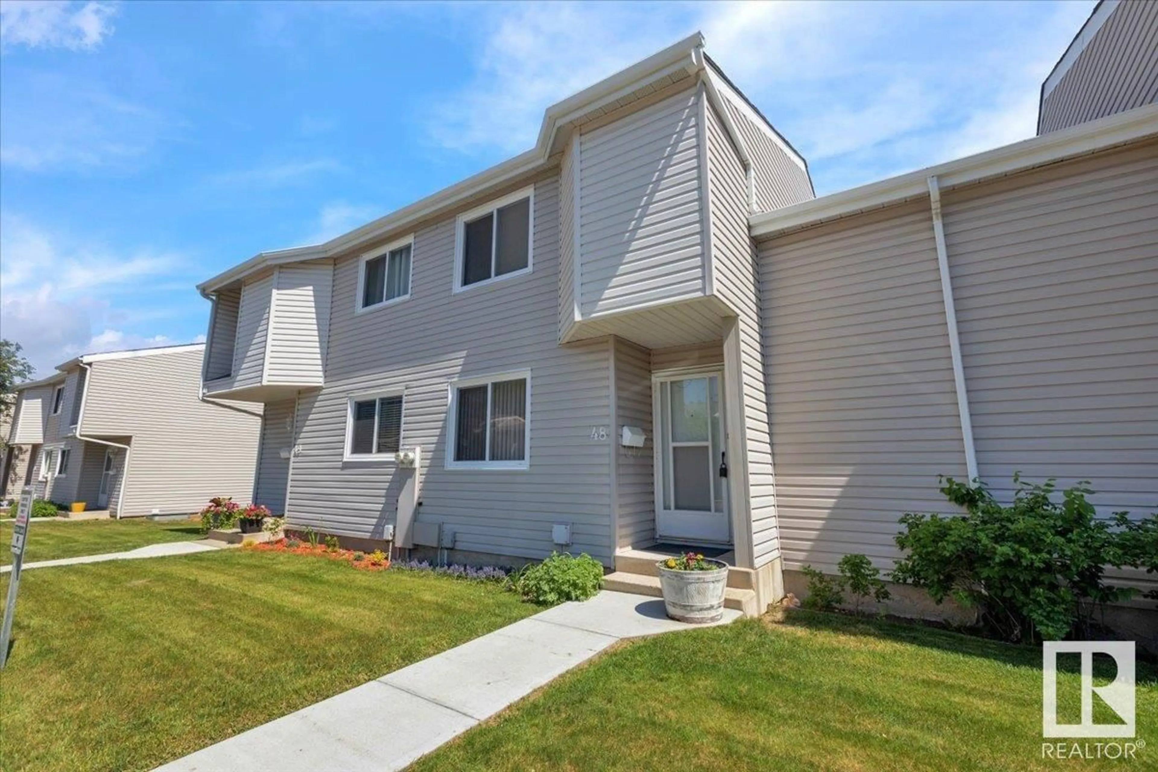 Home with vinyl exterior material, street for 48 - 3221 119 ST, Edmonton Alberta T6J5K7