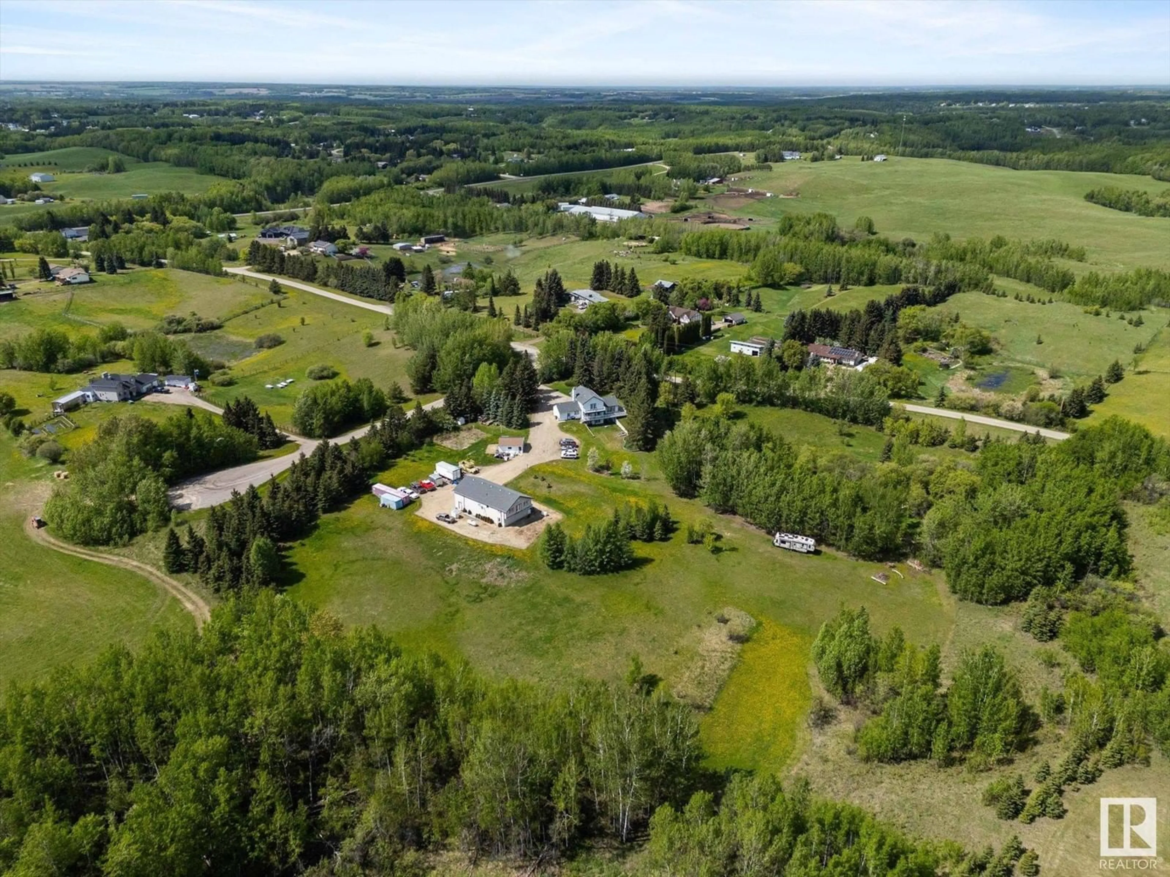 A pic from outside/outdoor area/front of a property/back of a property/a pic from drone, unknown for #11 - 53227 RGE ROAD 14, Rural Parkland County Alberta T7Y0G3