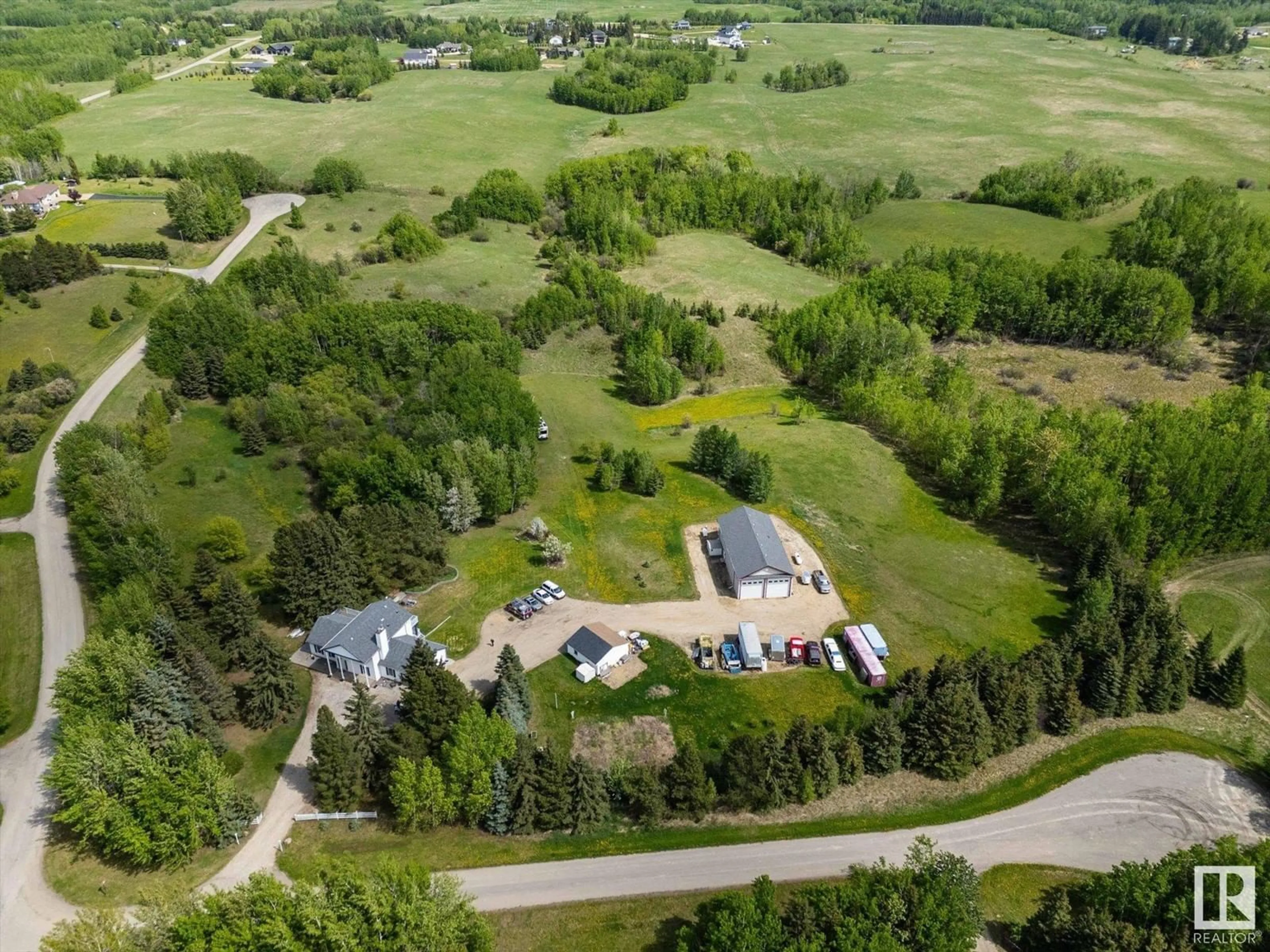 A pic from outside/outdoor area/front of a property/back of a property/a pic from drone, unknown for #11 - 53227 RGE ROAD 14, Rural Parkland County Alberta T7Y0G3