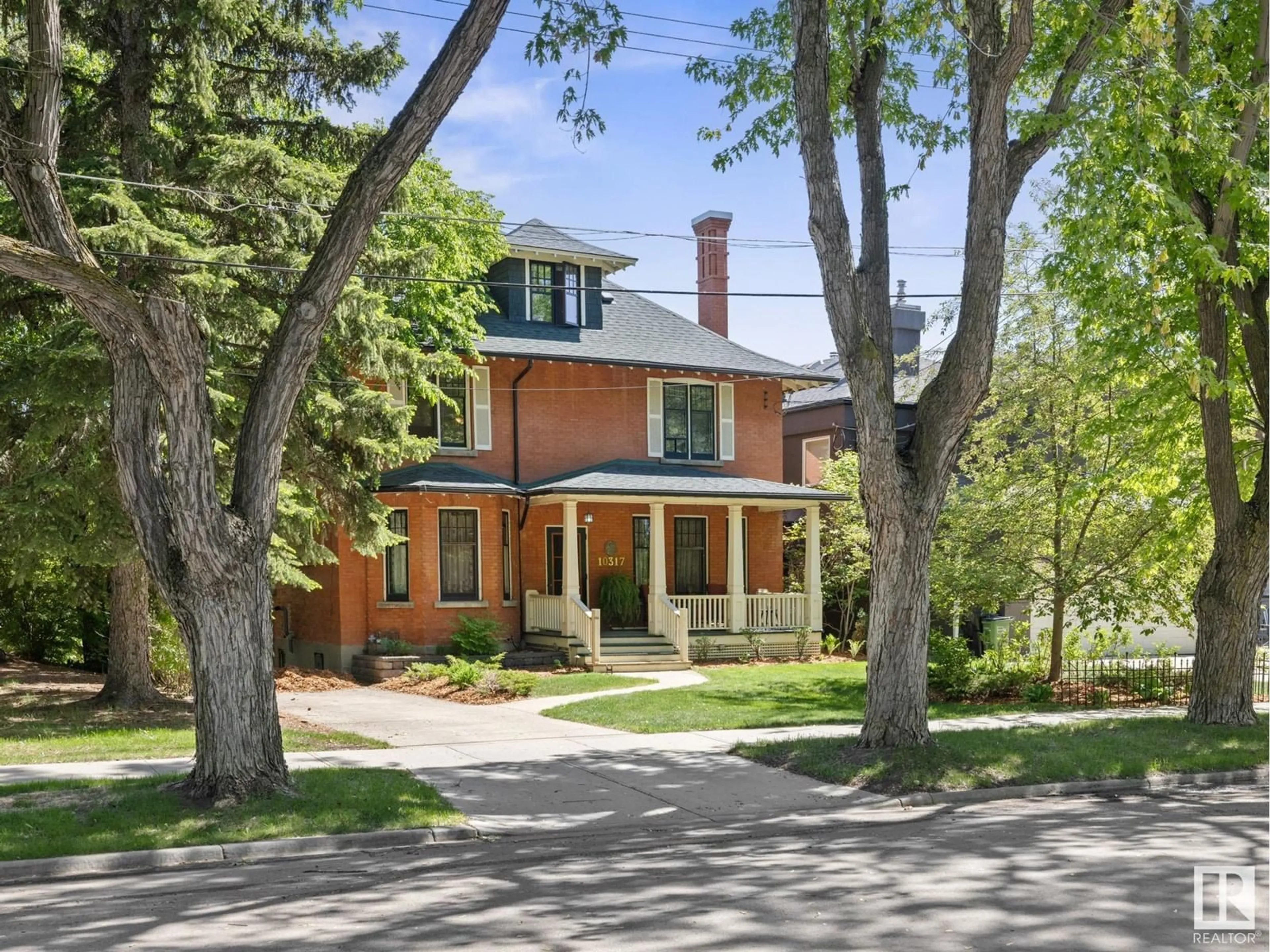 Home with brick exterior material, street for 10317 VILLA AV NW, Edmonton Alberta T5N3T8