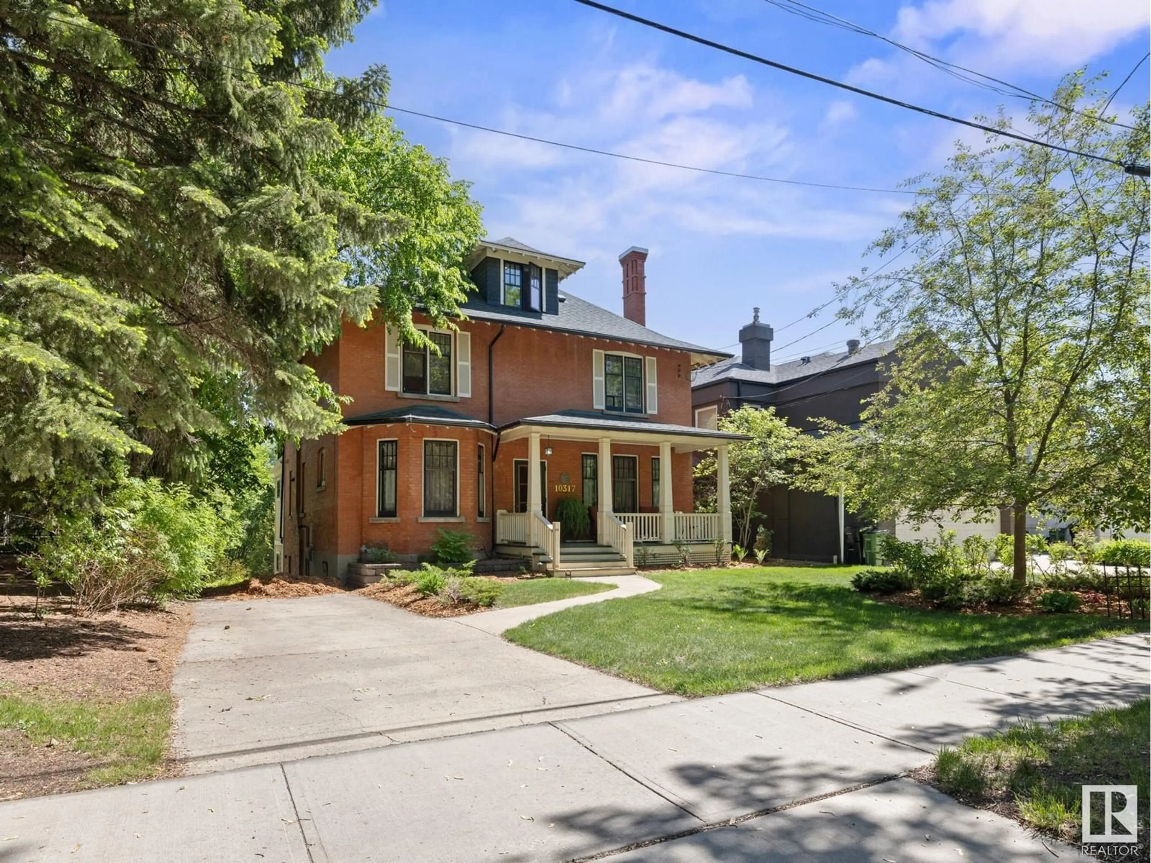 Home with brick exterior material, street for 10317 VILLA AV NW, Edmonton Alberta T5N3T8