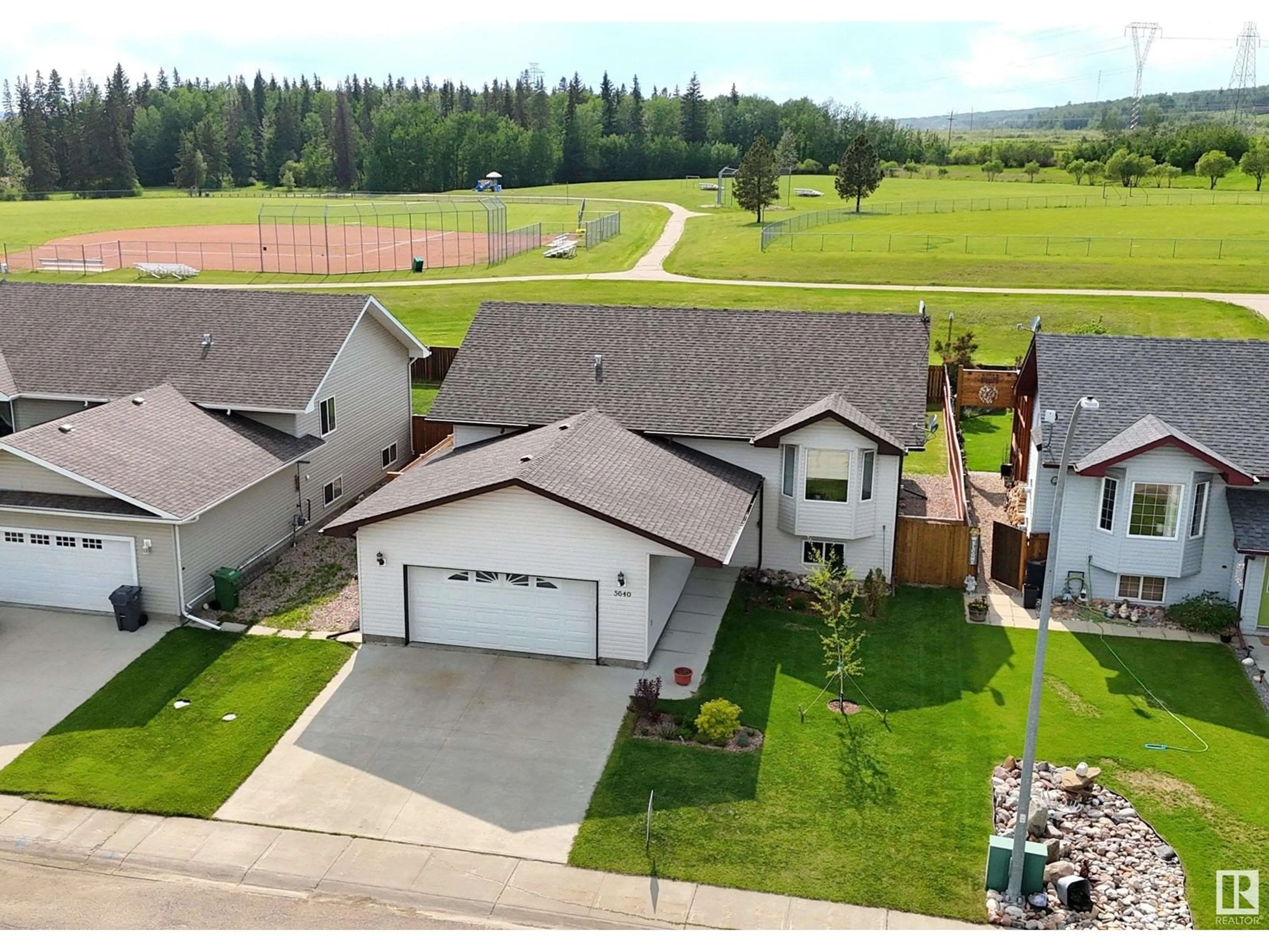 A pic from outside/outdoor area/front of a property/back of a property/a pic from drone, mountain view for 5640 52A ST, Wabamun Alberta T0E2K0