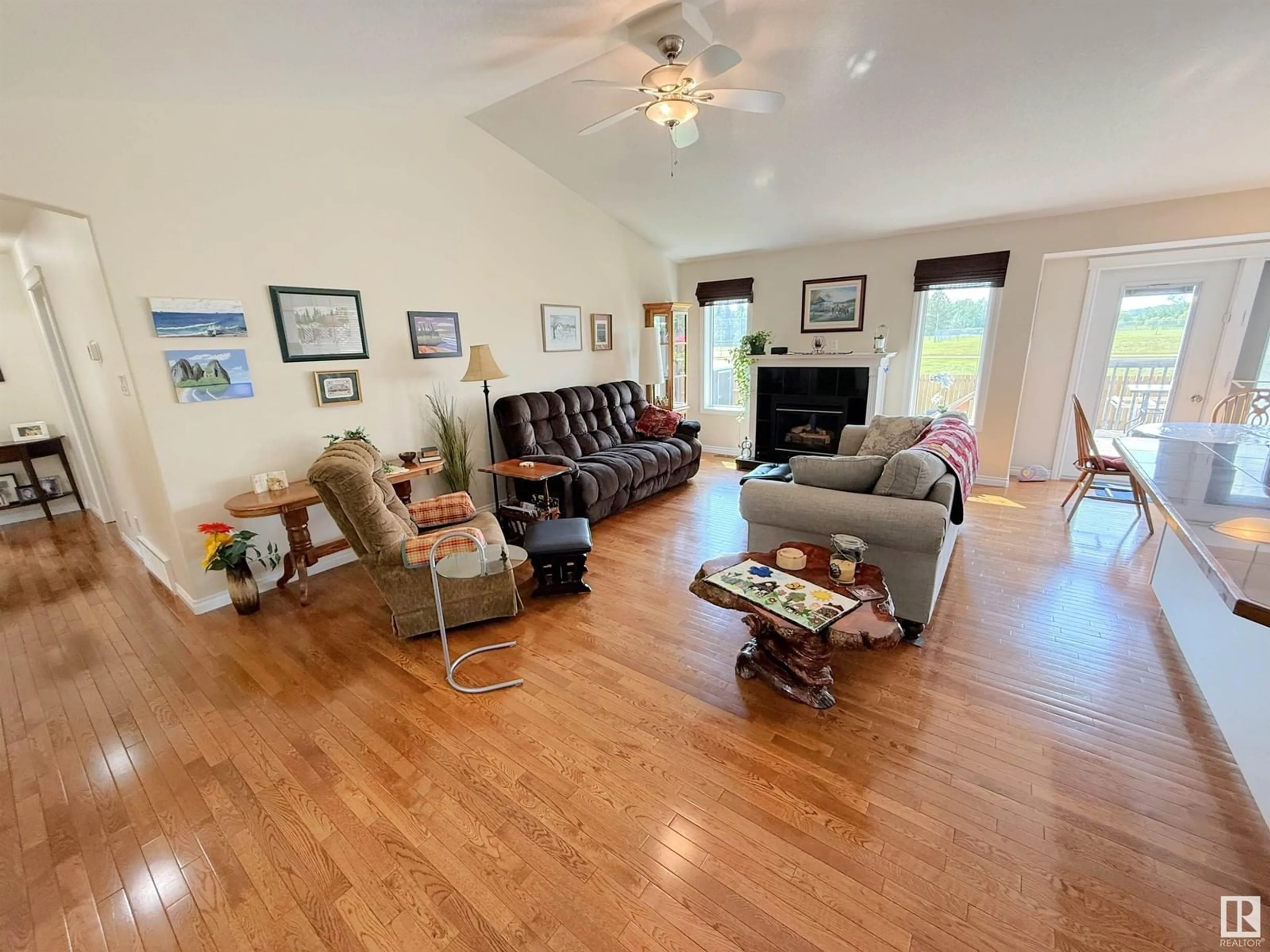 Living room with furniture, wood/laminate floor for 5640 52A ST, Wabamun Alberta T0E2K0