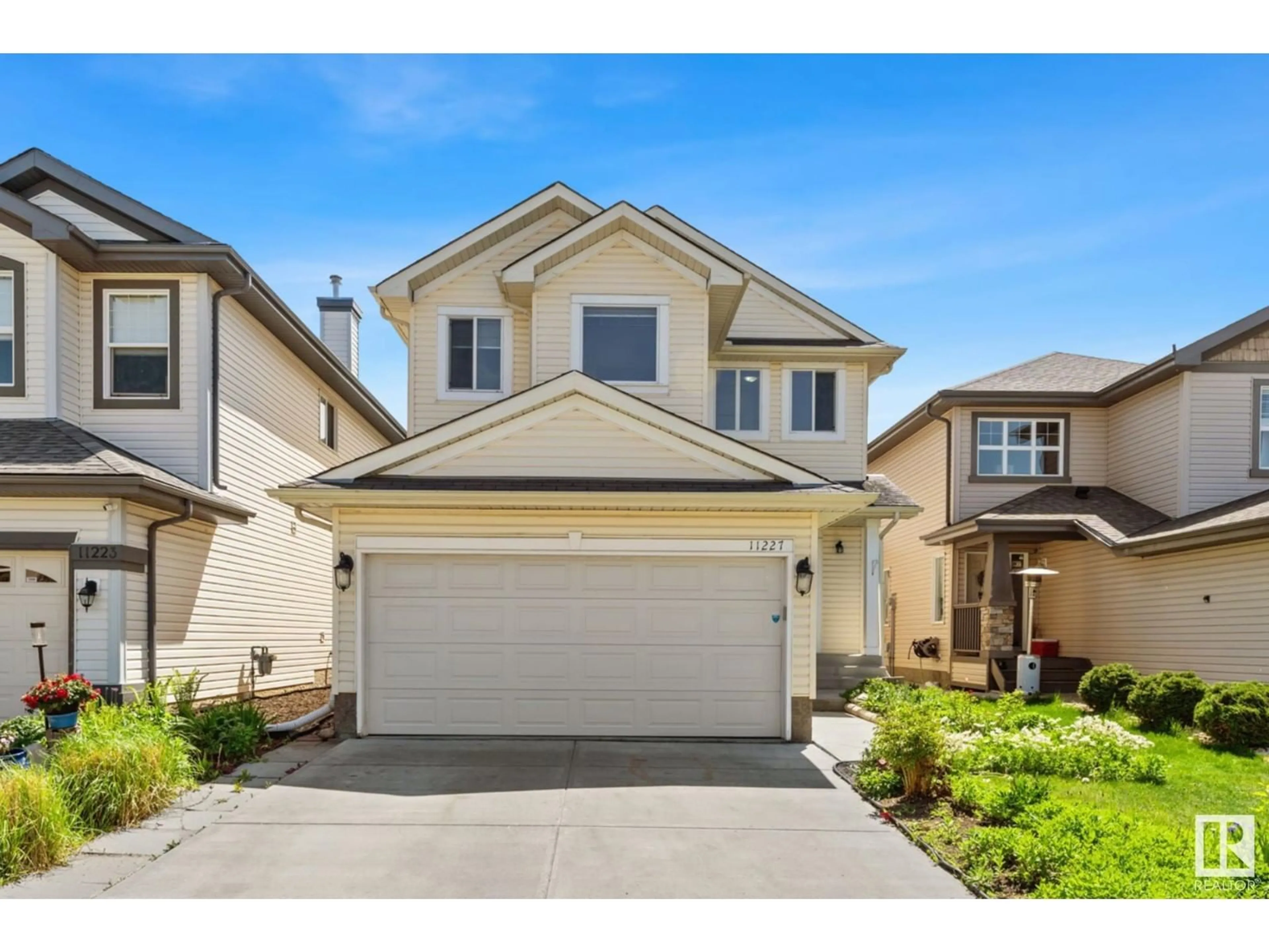 Home with vinyl exterior material, street for SW - 11227 11 AV, Edmonton Alberta T6W1S5