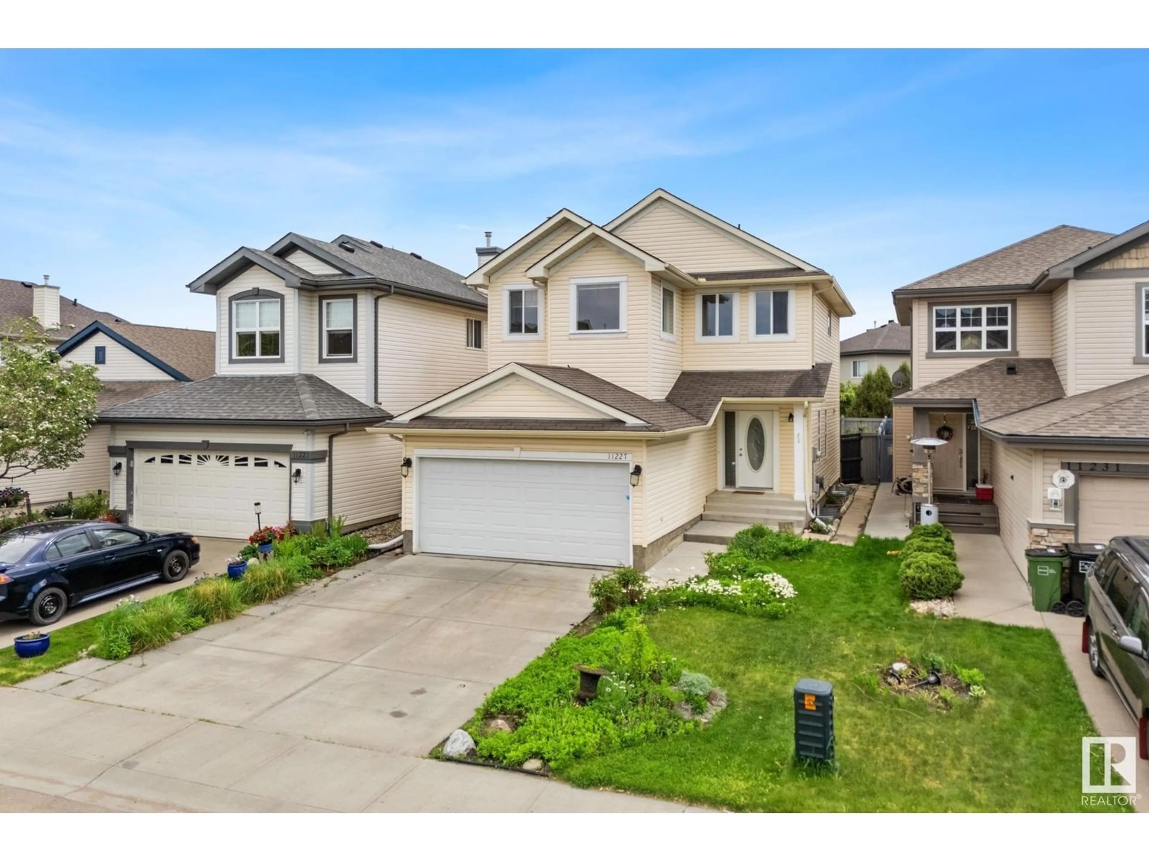 Home with vinyl exterior material, street for SW - 11227 11 AV, Edmonton Alberta T6W1S5