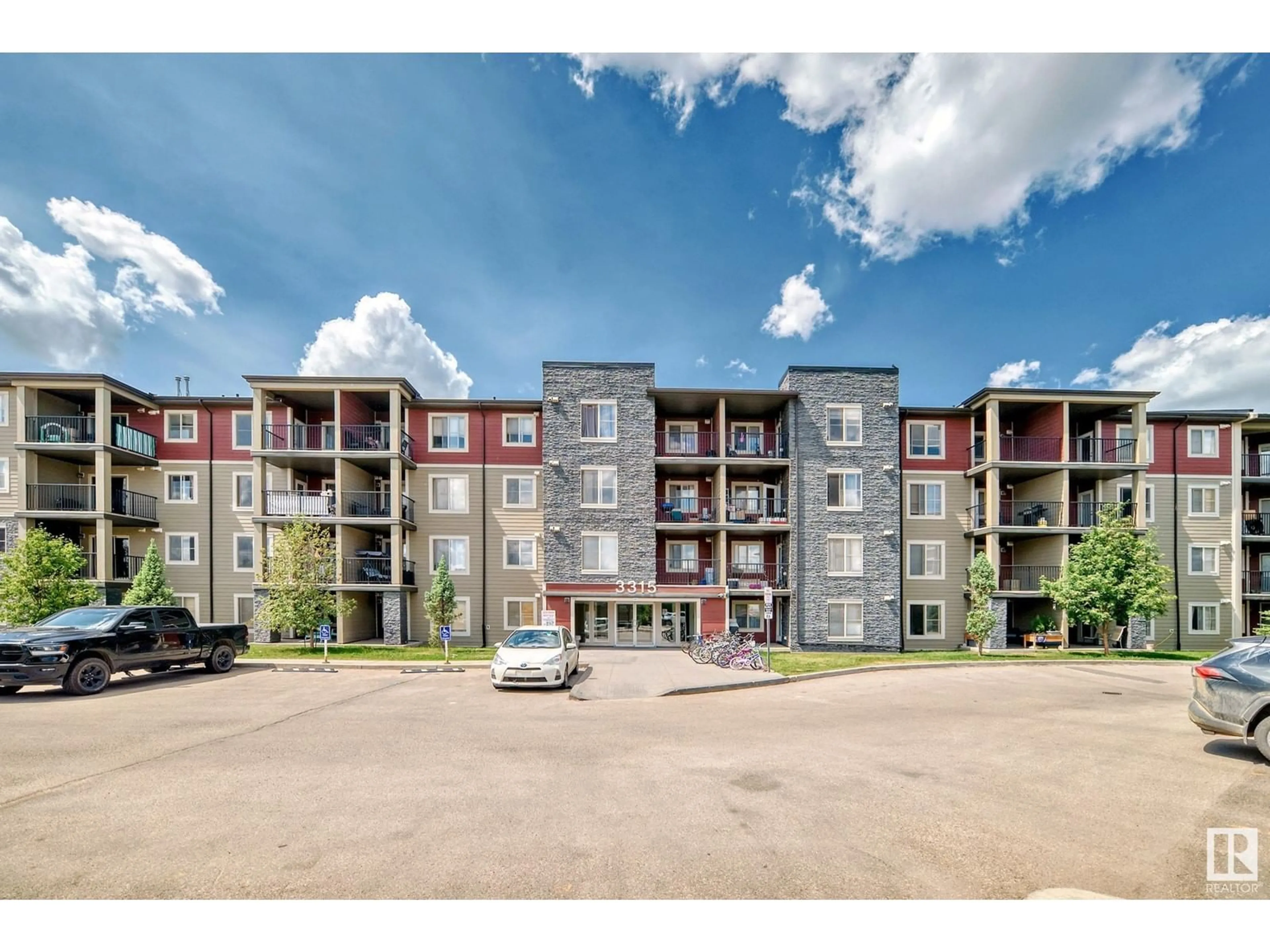 A pic from outside/outdoor area/front of a property/back of a property/a pic from drone, building for #427 - 3315 JAMES MOWATT TR, Edmonton Alberta T6W3L9