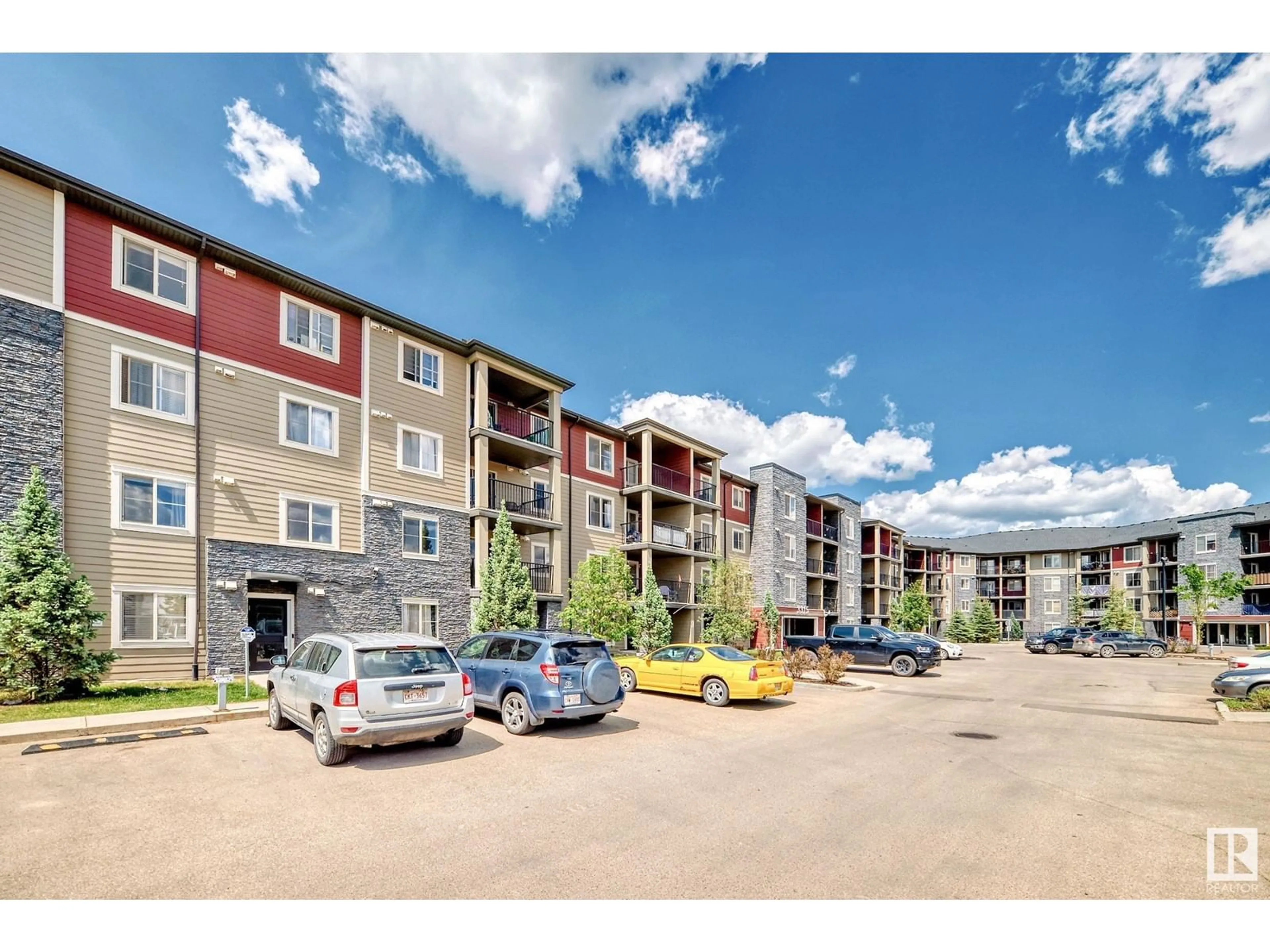 A pic from outside/outdoor area/front of a property/back of a property/a pic from drone, unknown for #427 - 3315 JAMES MOWATT TR, Edmonton Alberta T6W3L9