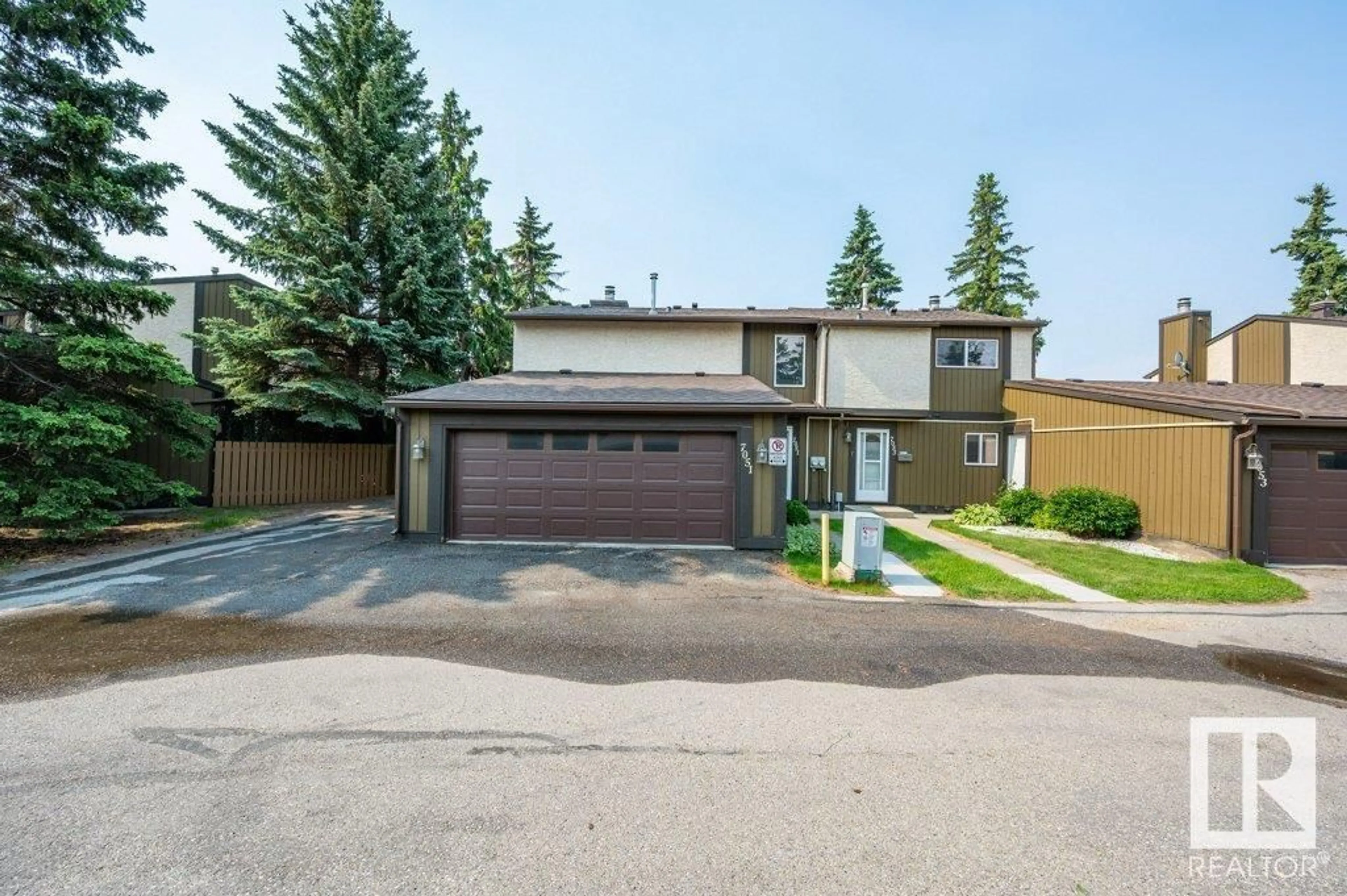 A pic from outside/outdoor area/front of a property/back of a property/a pic from drone, street for 7051 32 AV, Edmonton Alberta T6K2K9