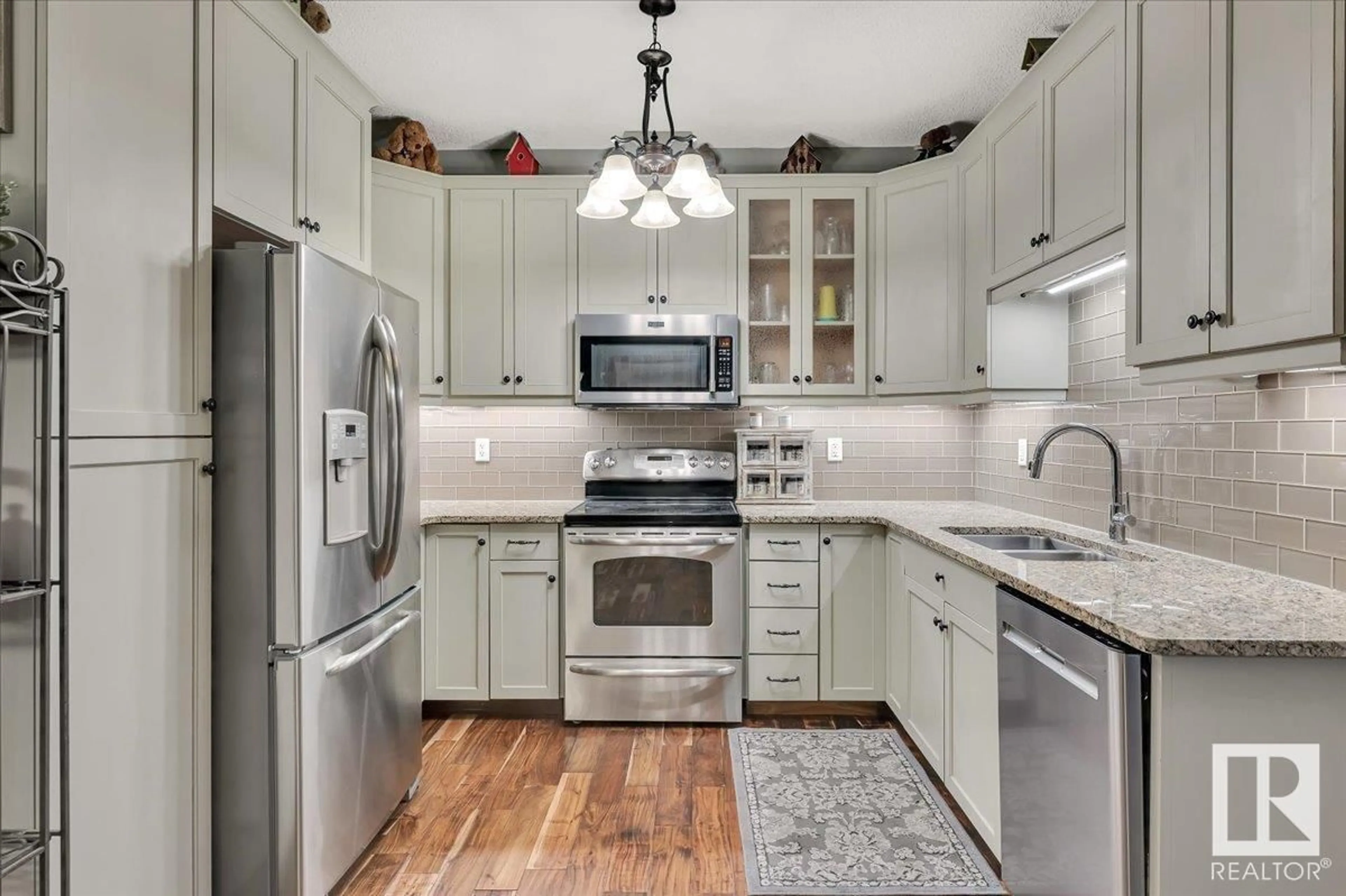 Open concept kitchen, ceramic/tile floor for 6079 - 136 MAYNARD WY, Edmonton Alberta T6R0S4