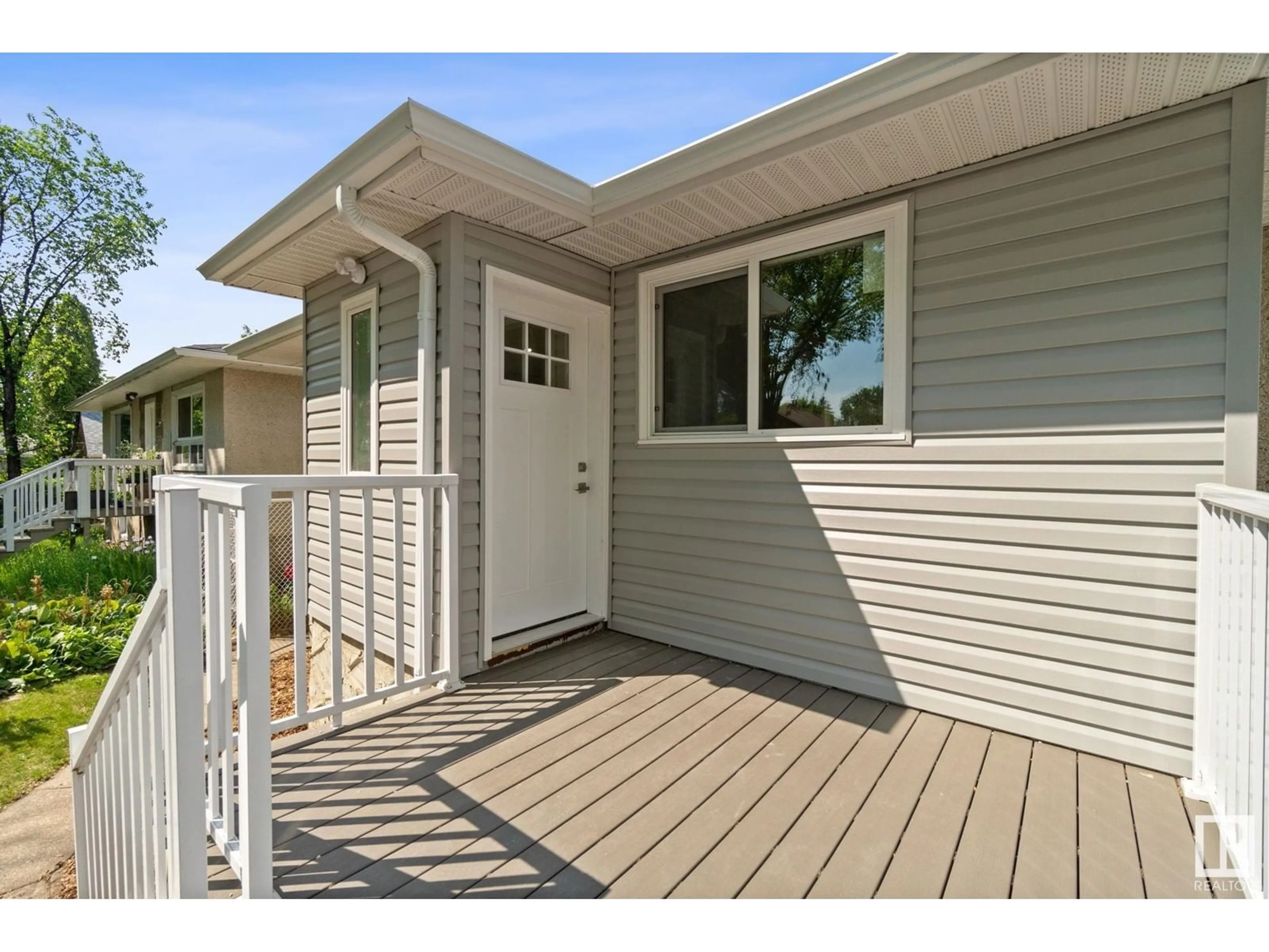 Home with vinyl exterior material, street for NW - 11920 69 ST, Edmonton Alberta T5B1S5