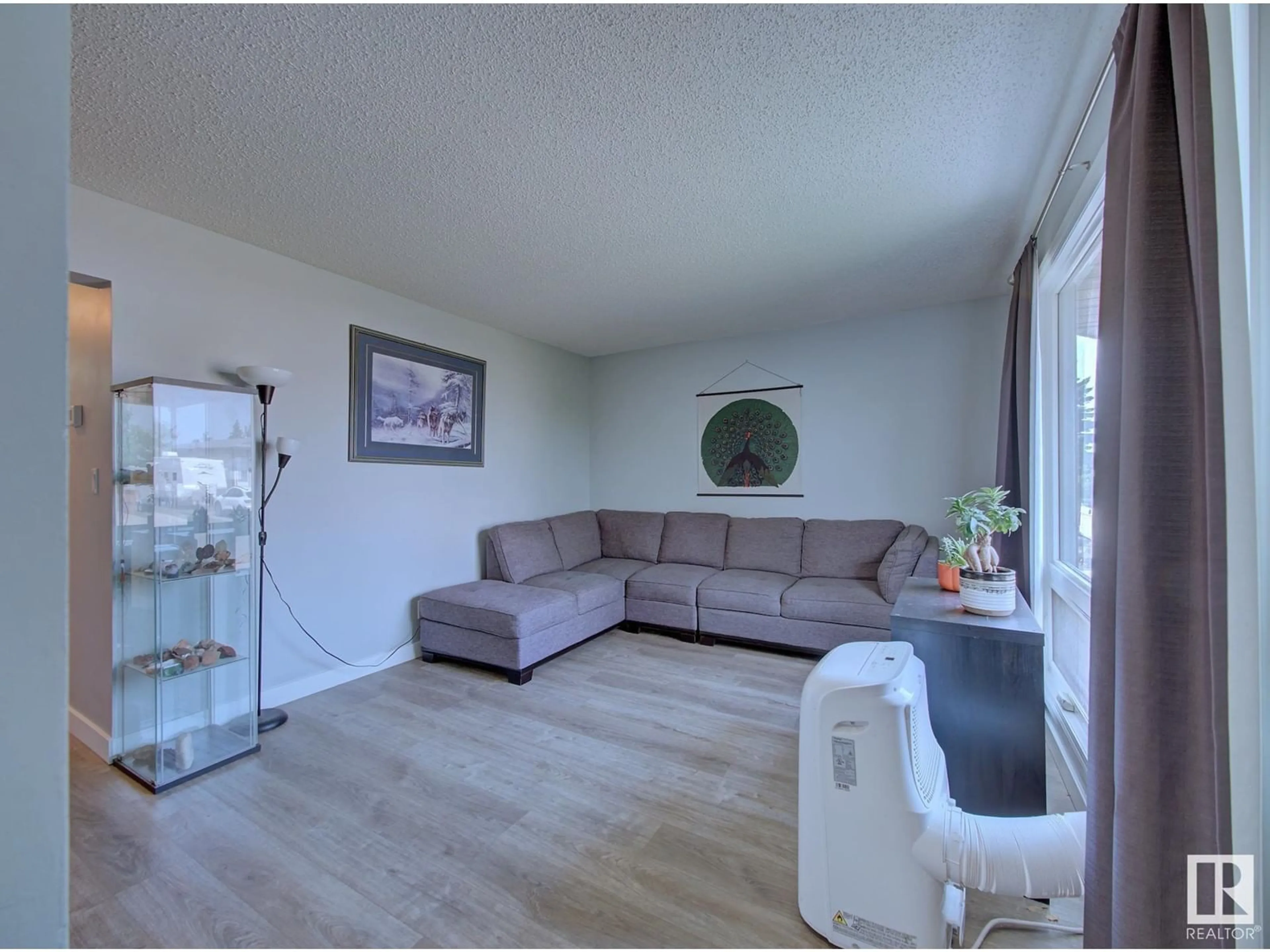Living room with furniture, unknown for 7915 92 AV, Fort Saskatchewan Alberta T8L3N1