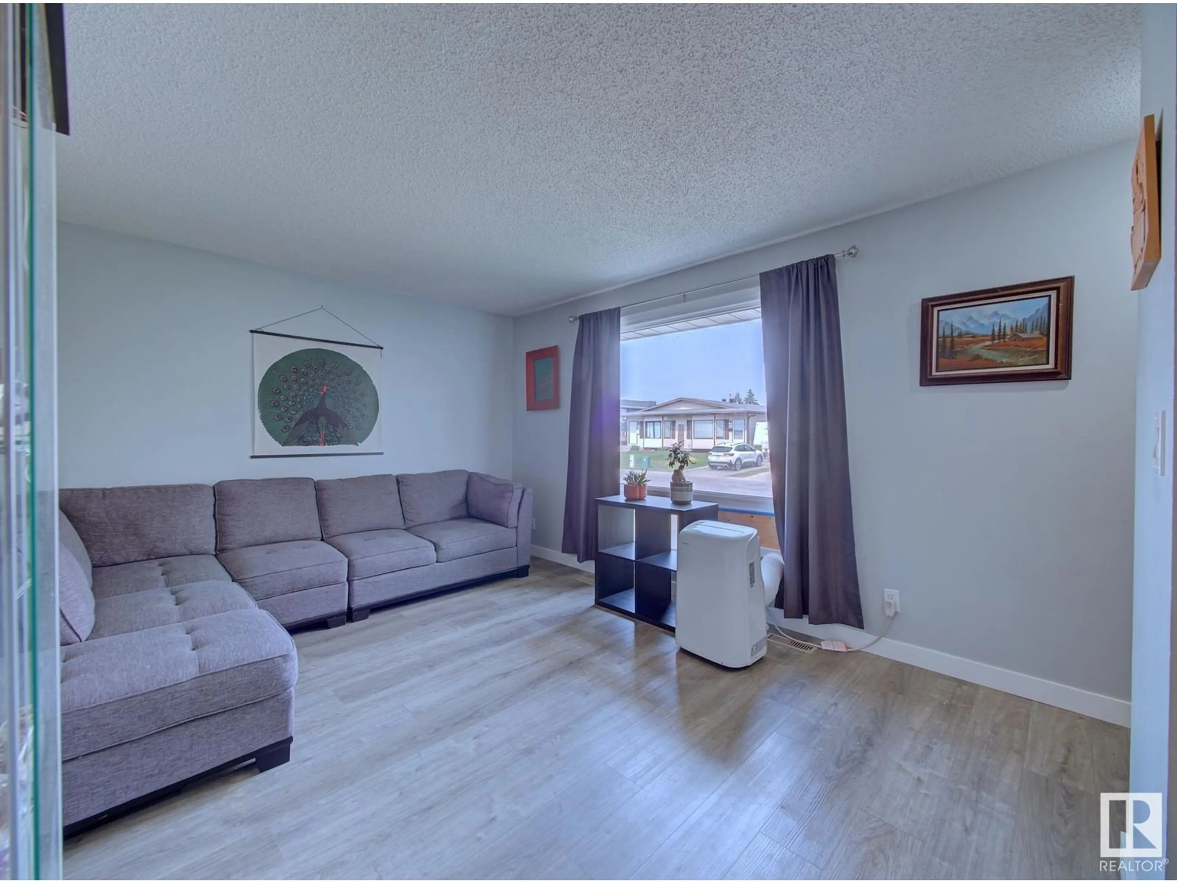 Living room with furniture, unknown for 7915 92 AV, Fort Saskatchewan Alberta T8L3N1