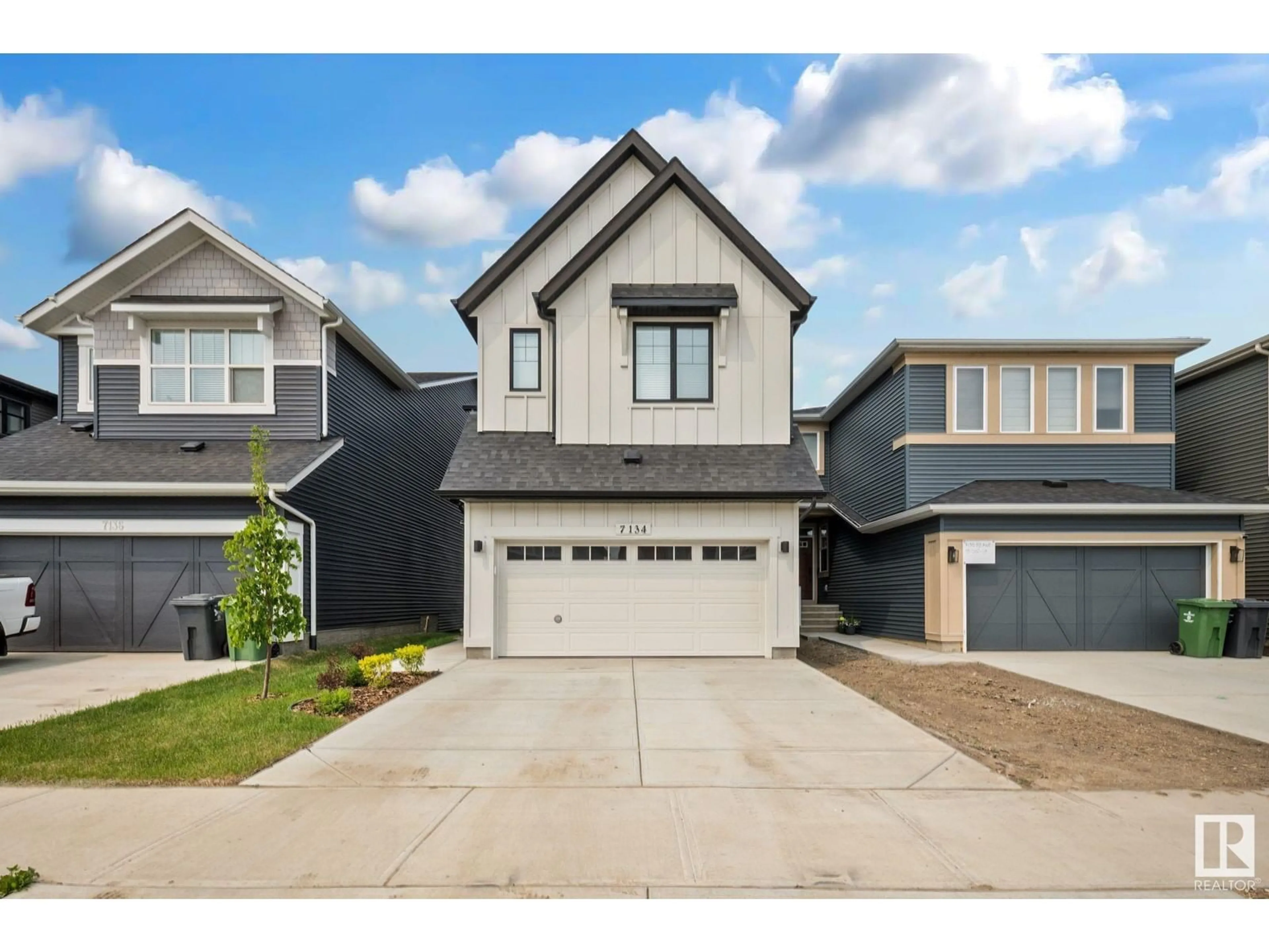 Home with vinyl exterior material, street for 7134 52 AV, Beaumont Alberta T4Z2Z8