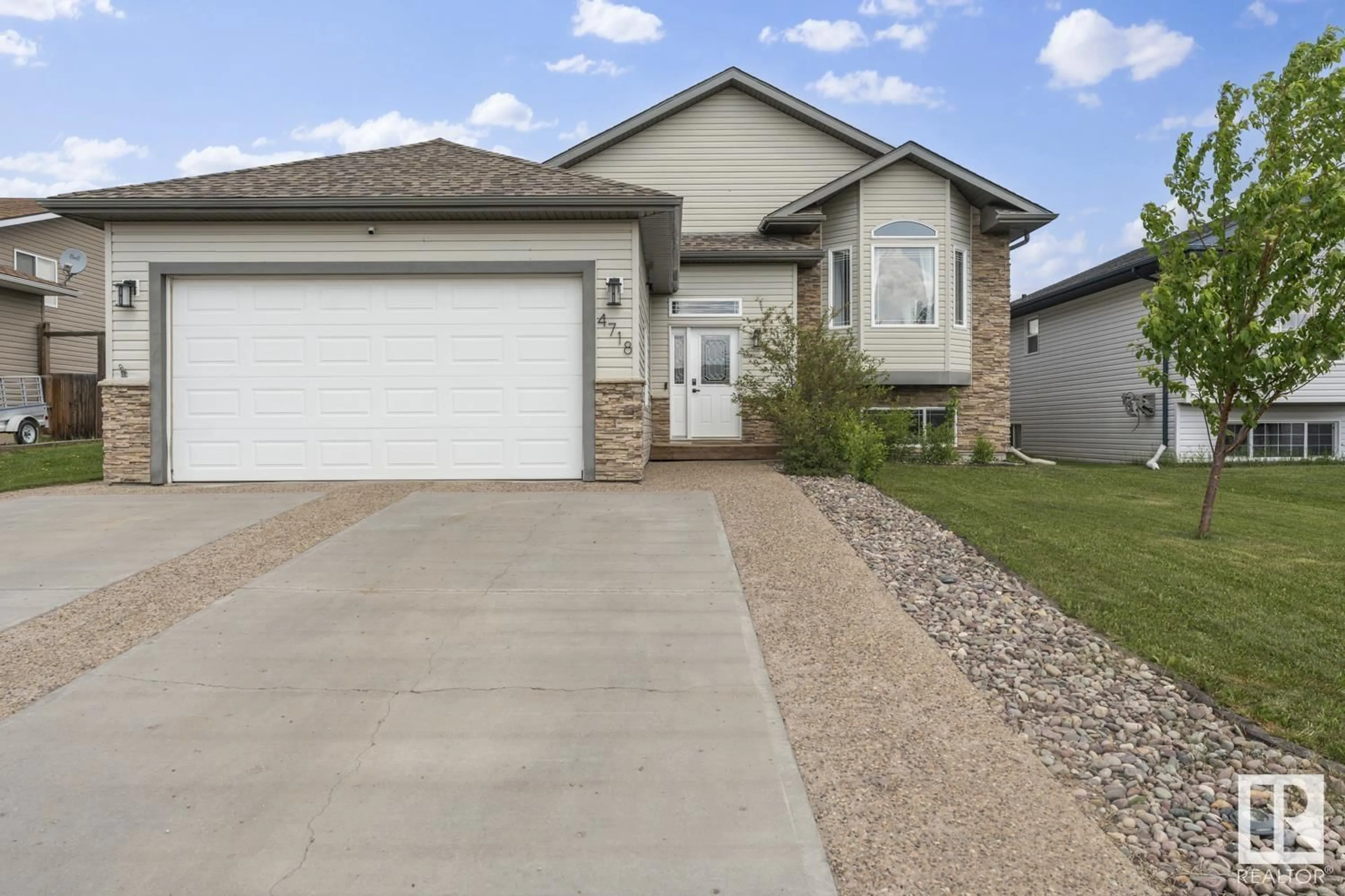 Home with vinyl exterior material, street for 4718 63 AV, Cold Lake Alberta T9M2B6