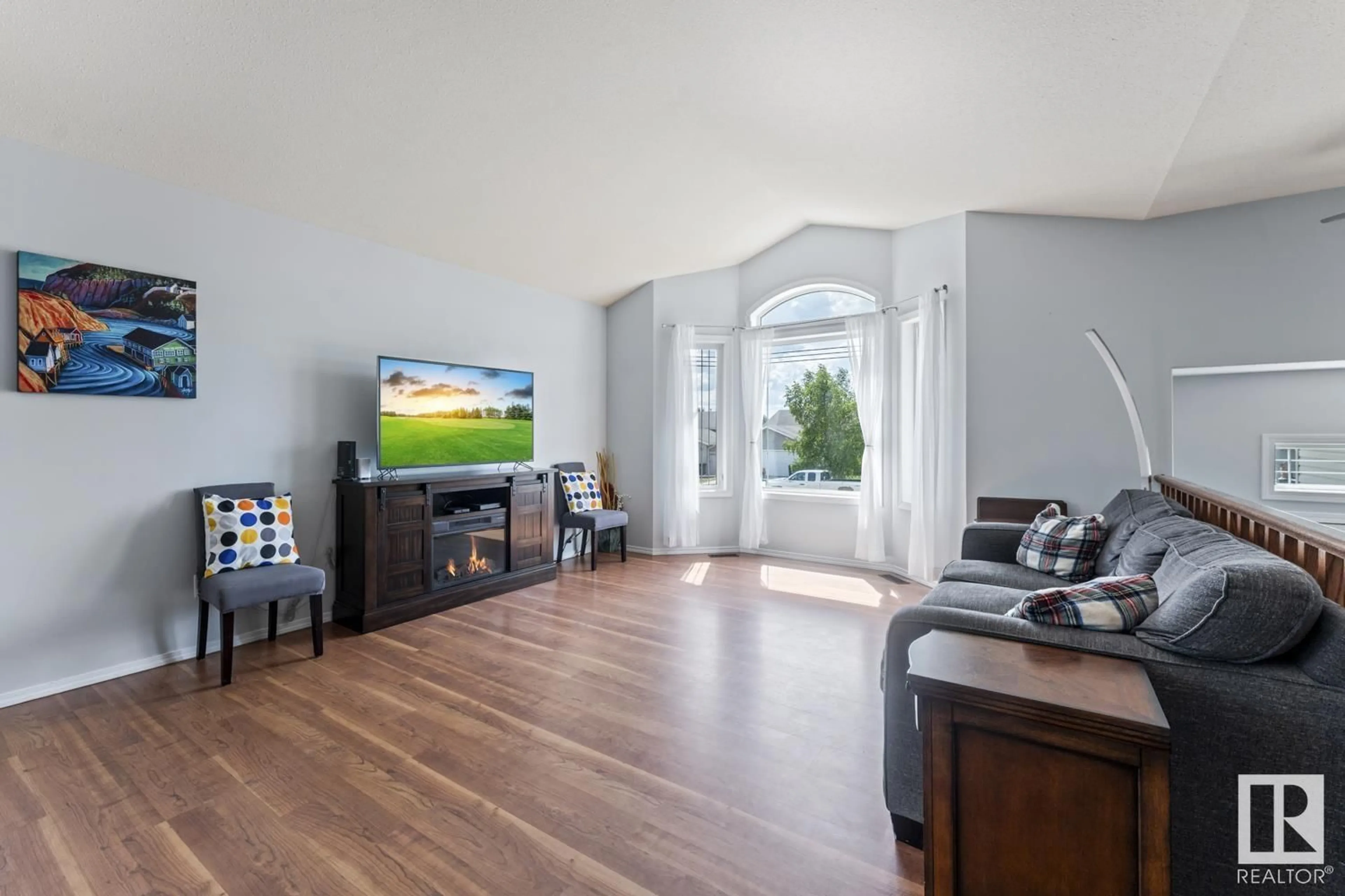 Living room with furniture, wood/laminate floor for 4718 63 AV, Cold Lake Alberta T9M2B6