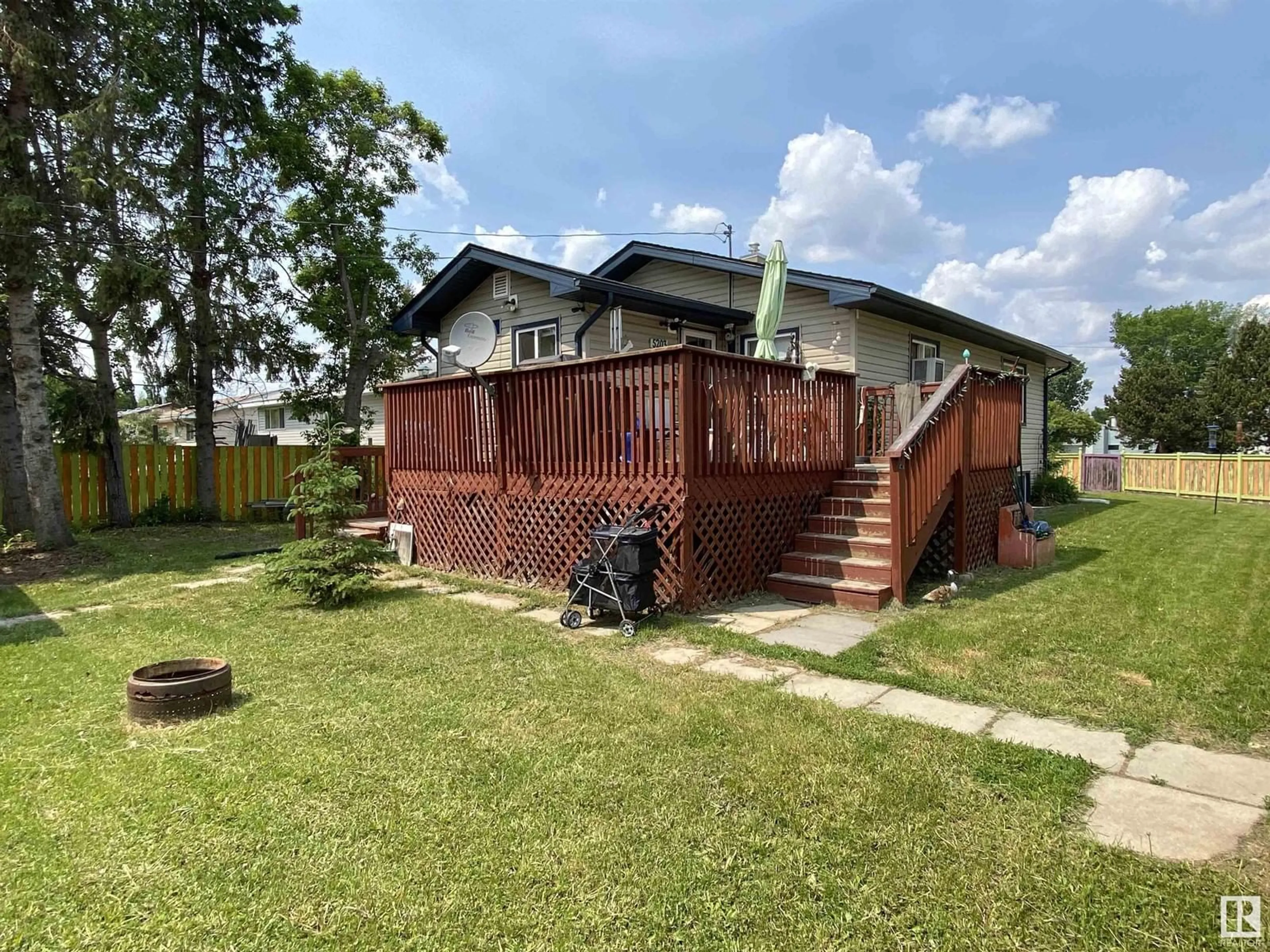 A pic from outside/outdoor area/front of a property/back of a property/a pic from drone, street for 5203 53 AV, Warburg Alberta T0C2T0