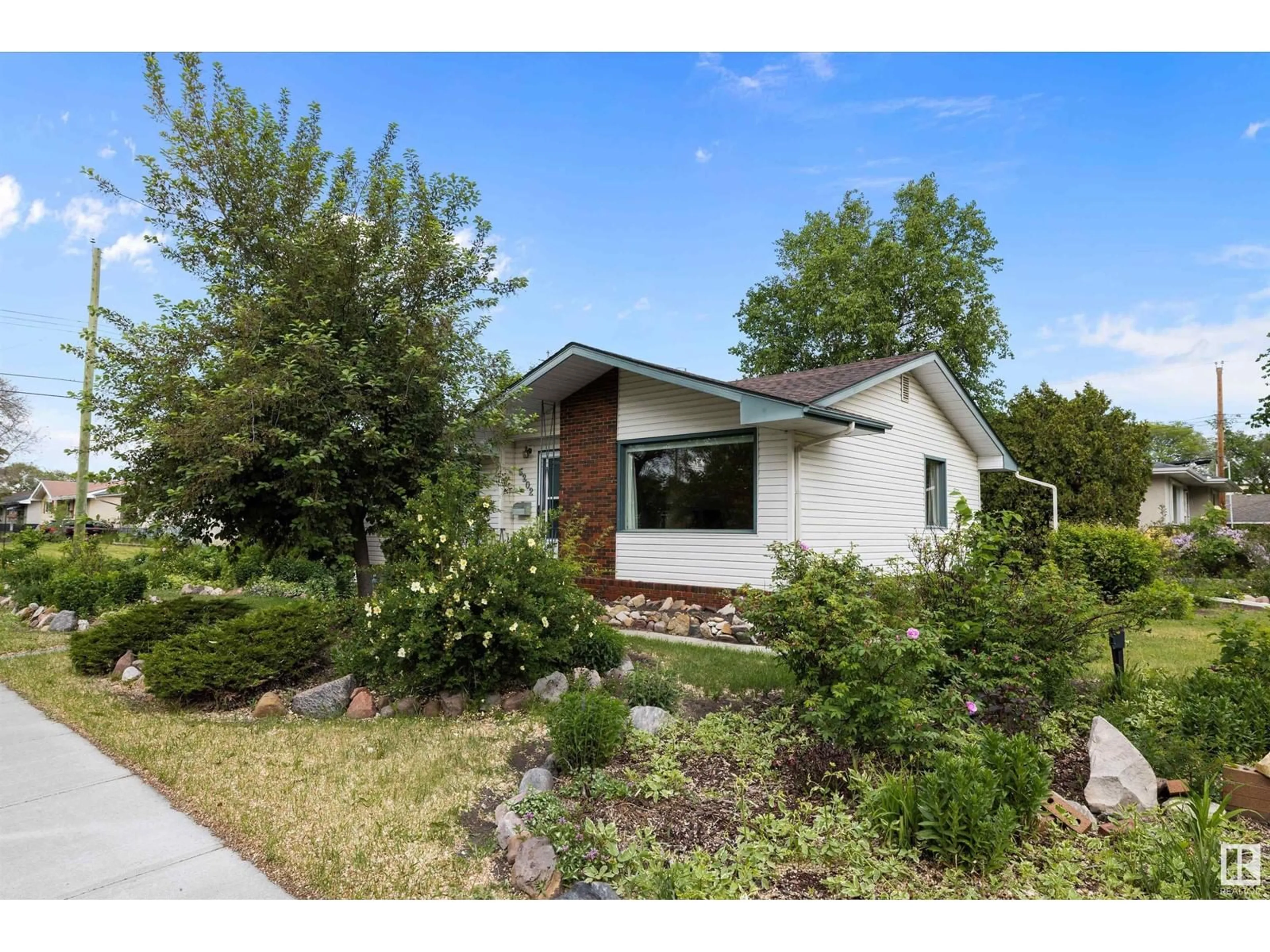 Home with vinyl exterior material, street for 5202 46 AV, Leduc Alberta T9E5C8