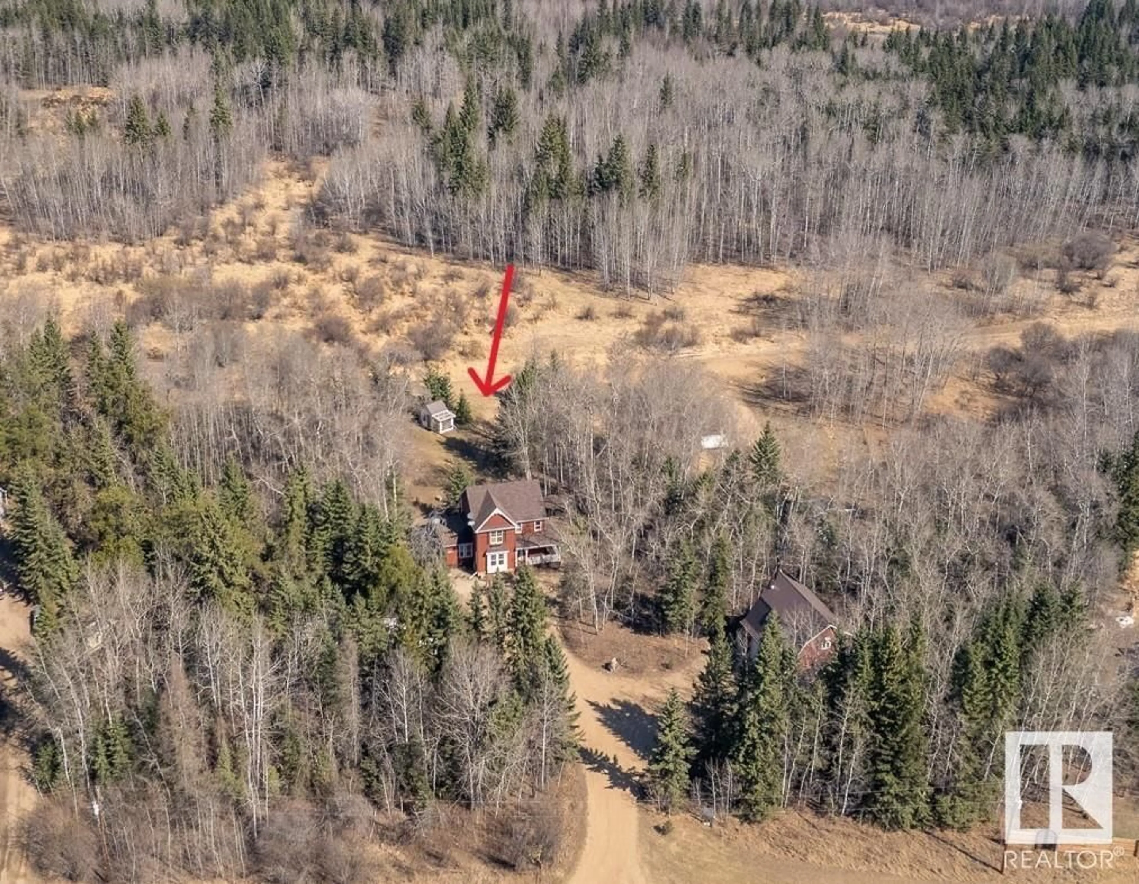 A pic from outside/outdoor area/front of a property/back of a property/a pic from drone, forest/trees view for 59031 RGE RD 232, Rural Thorhild County Alberta T0A2W0