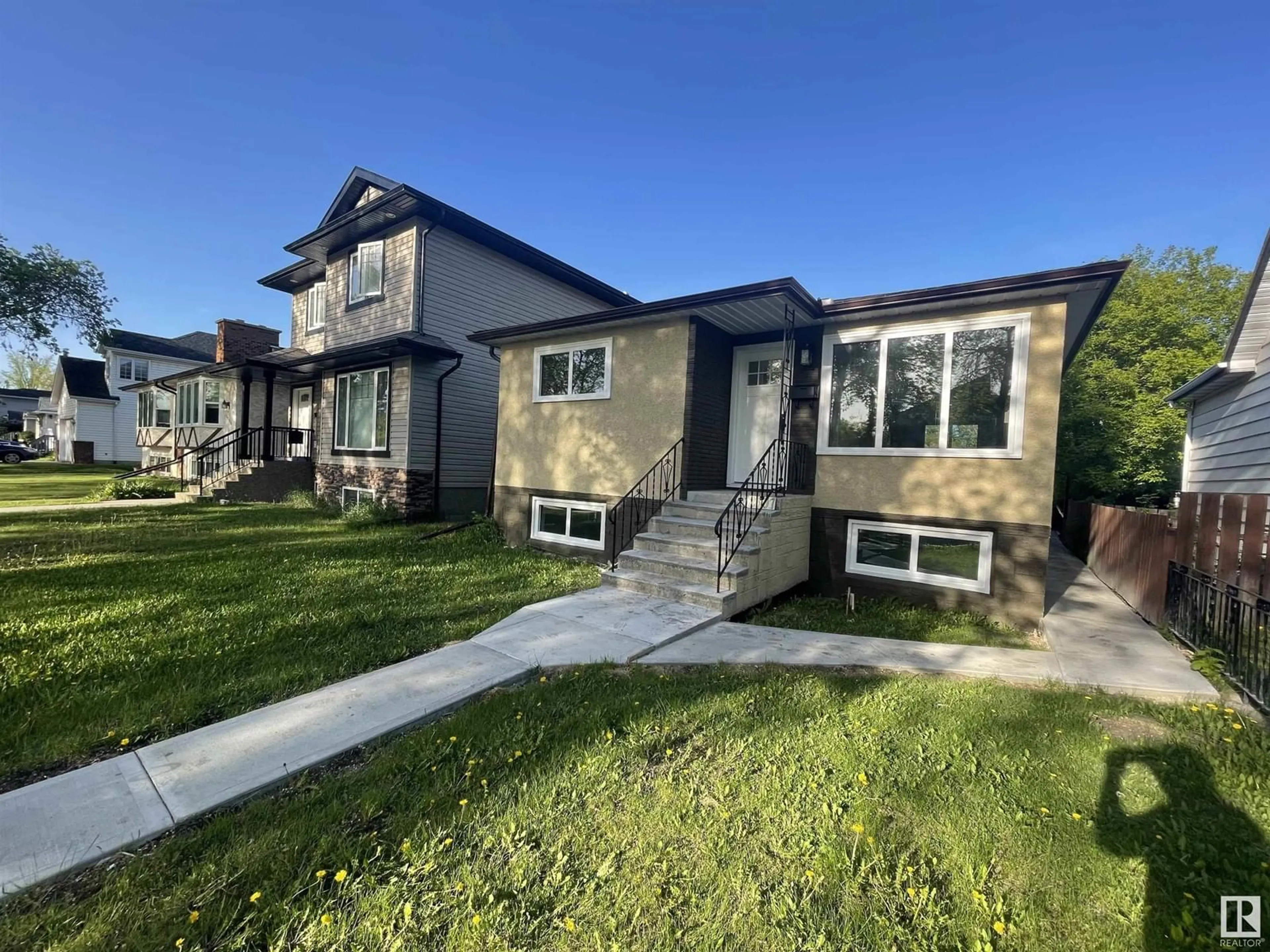 Home with vinyl exterior material, street for 12307 85 ST, Edmonton Alberta T5B3H1