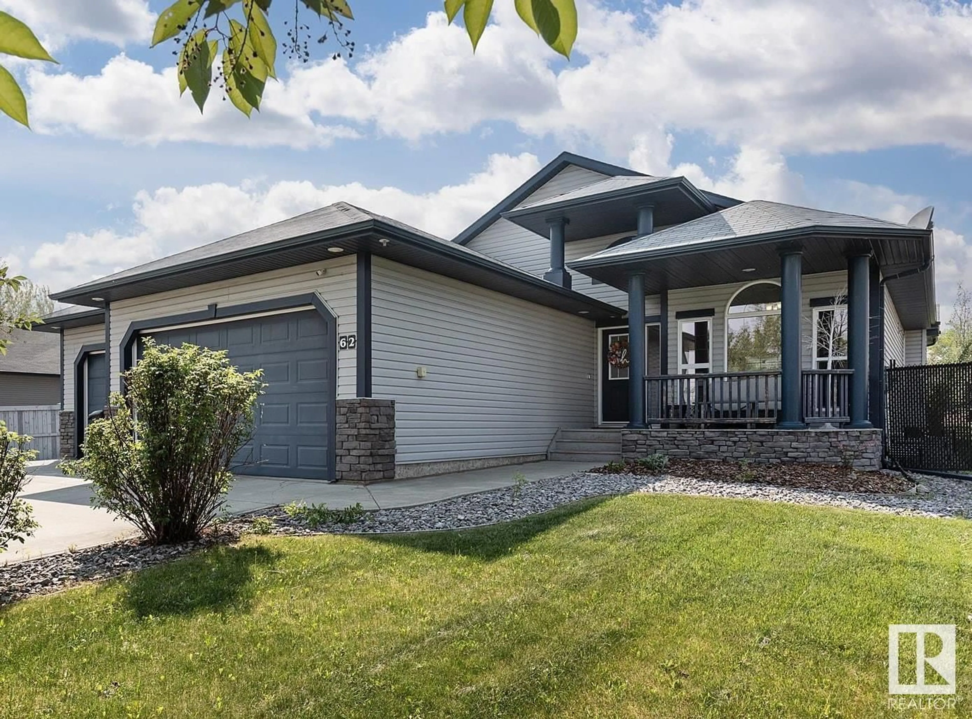 Home with vinyl exterior material, street for 62 GREENFIELD WD, Fort Saskatchewan Alberta T8L0E3