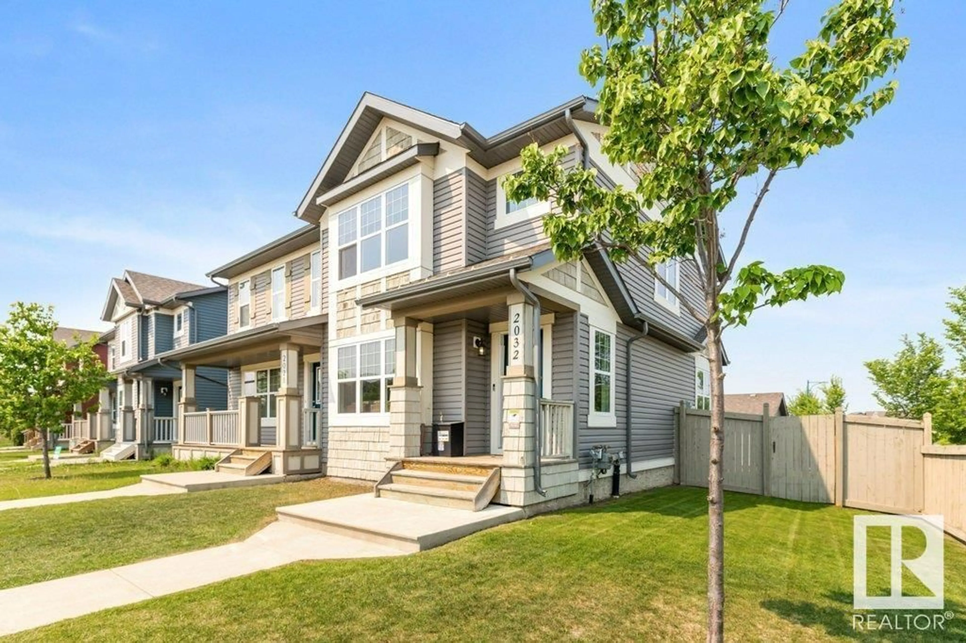Home with vinyl exterior material, street for 2032 32 ST, Edmonton Alberta T6T0K4
