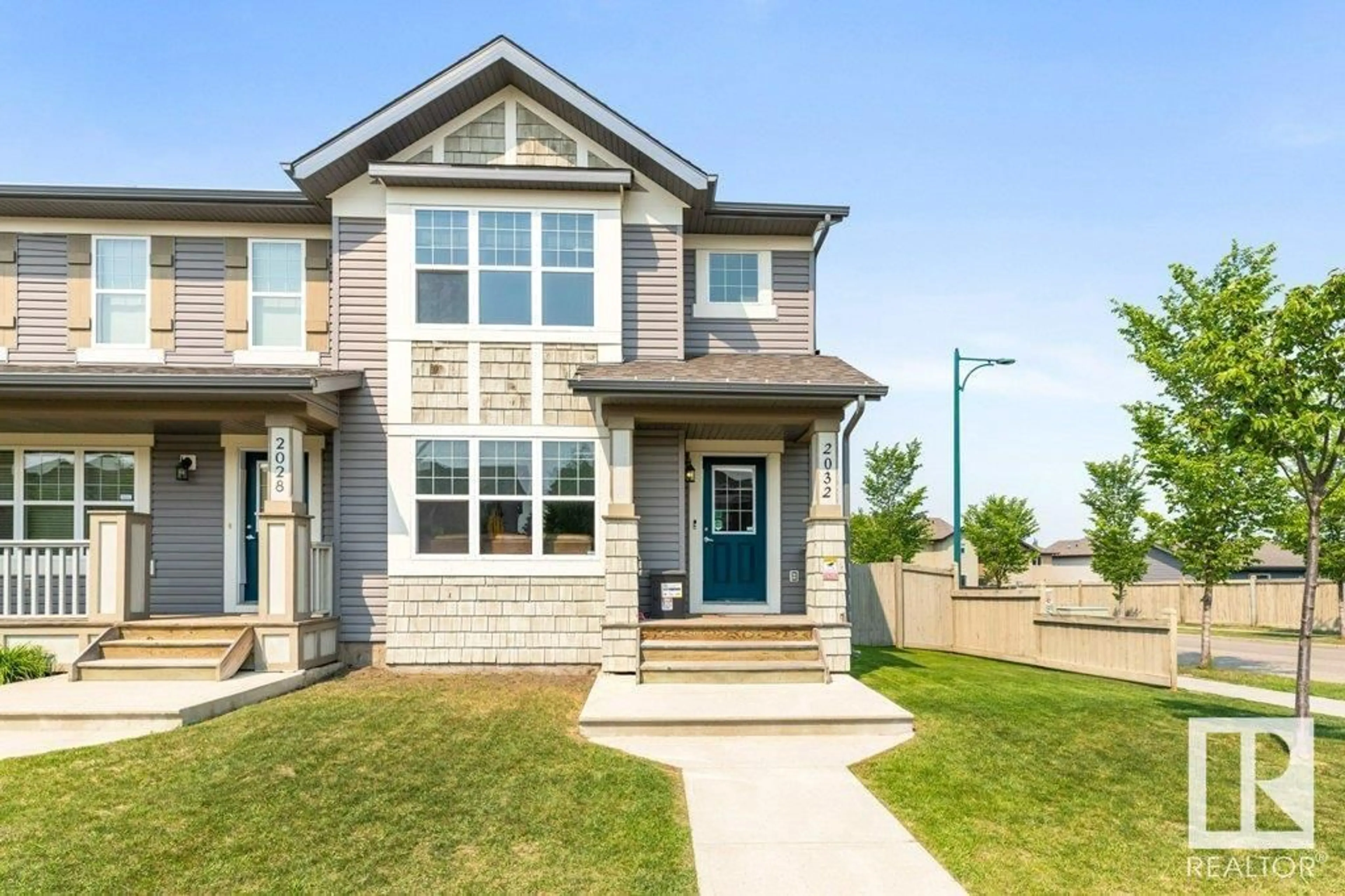 Home with vinyl exterior material, street for 2032 32 ST, Edmonton Alberta T6T0K4
