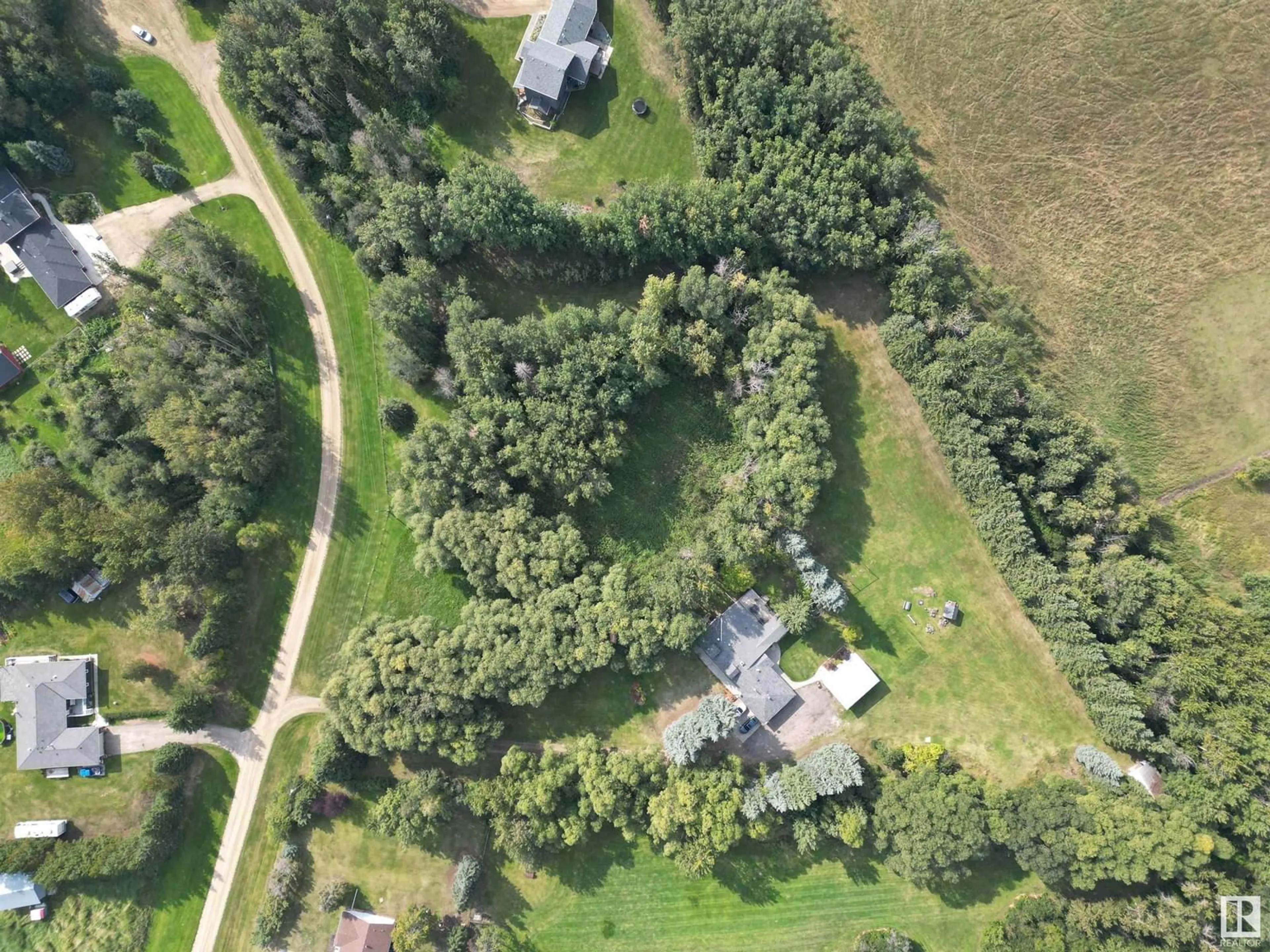 A pic from outside/outdoor area/front of a property/back of a property/a pic from drone, forest/trees view for 53306 HGHWAY 779, Rural Parkland County Alberta T7Y0A1