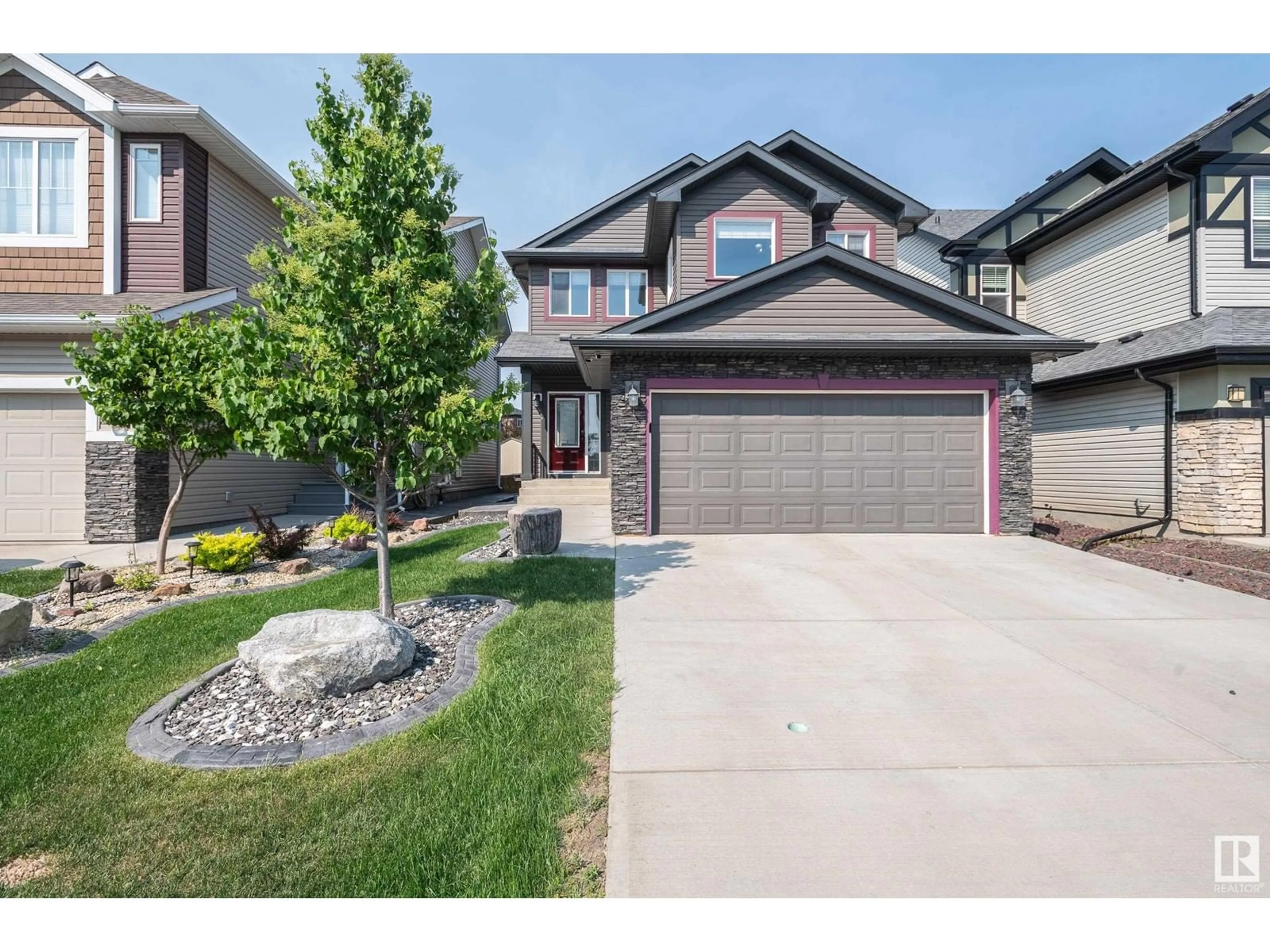 Home with brick exterior material, street for 17056 43 ST, Edmonton Alberta T5Y0Z3