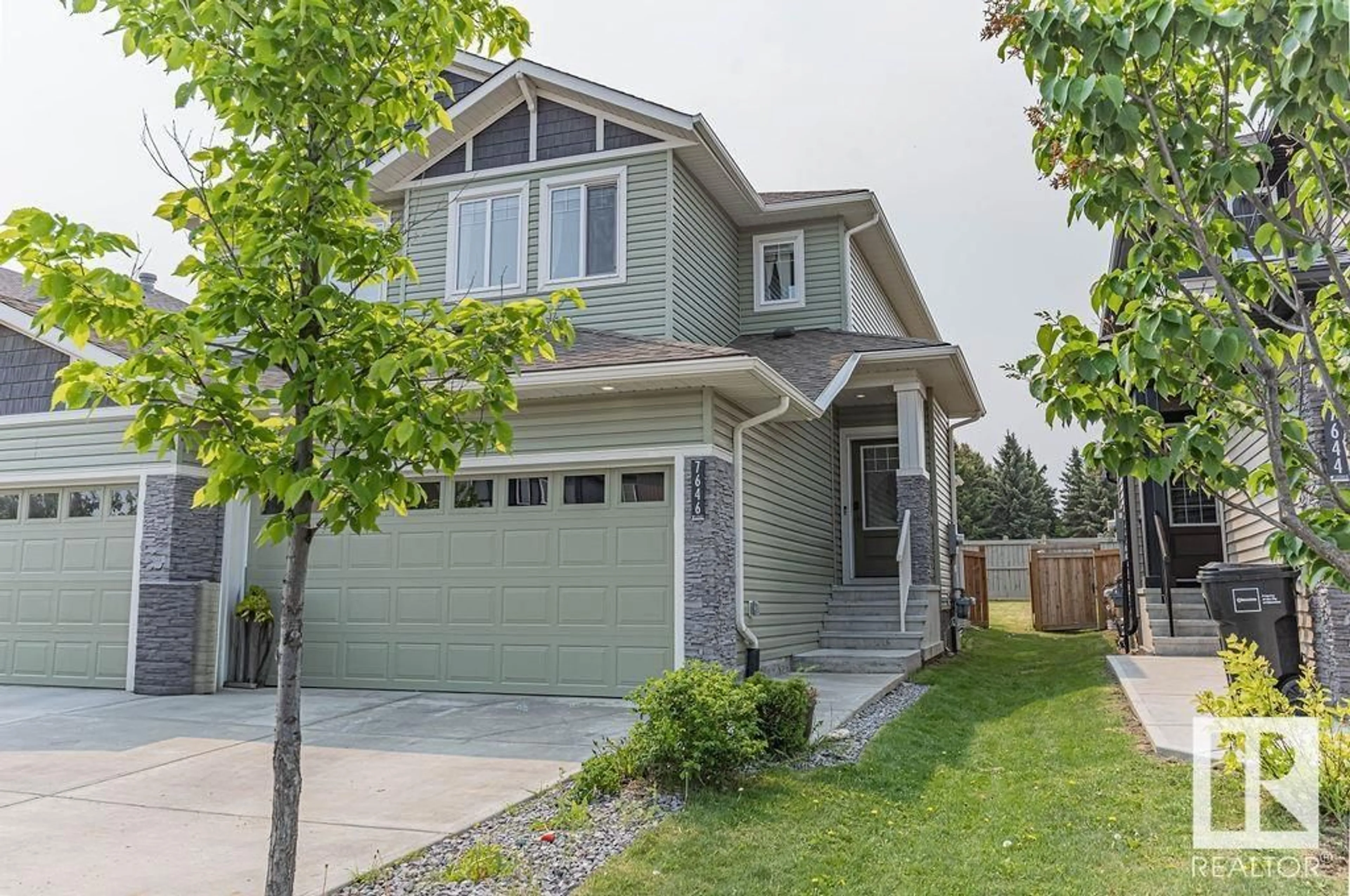Home with vinyl exterior material, street for 7646 CREIGHTON PL, Edmonton Alberta T6W3Z5