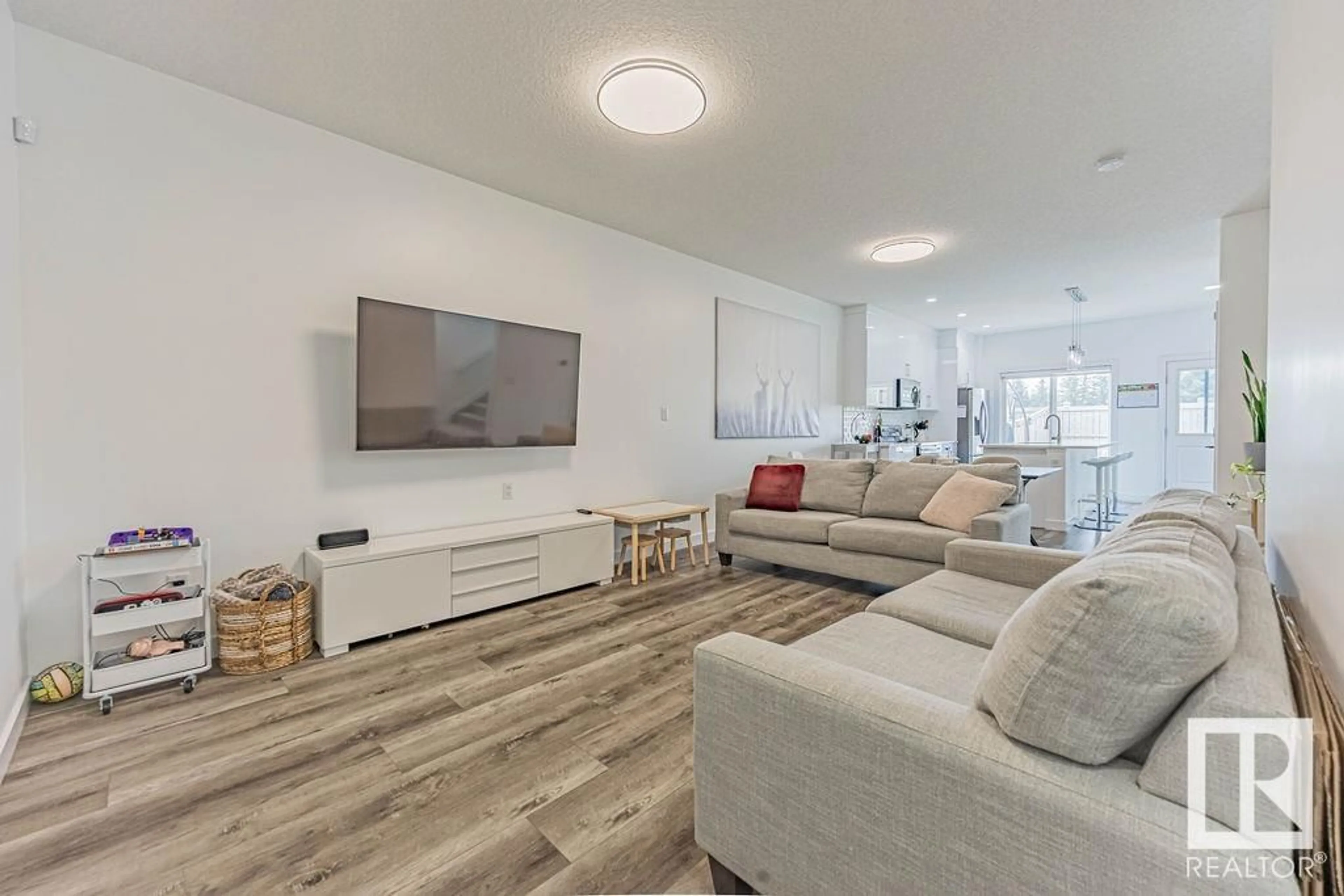 Living room with furniture, unknown for 7646 CREIGHTON PL, Edmonton Alberta T6W3Z5