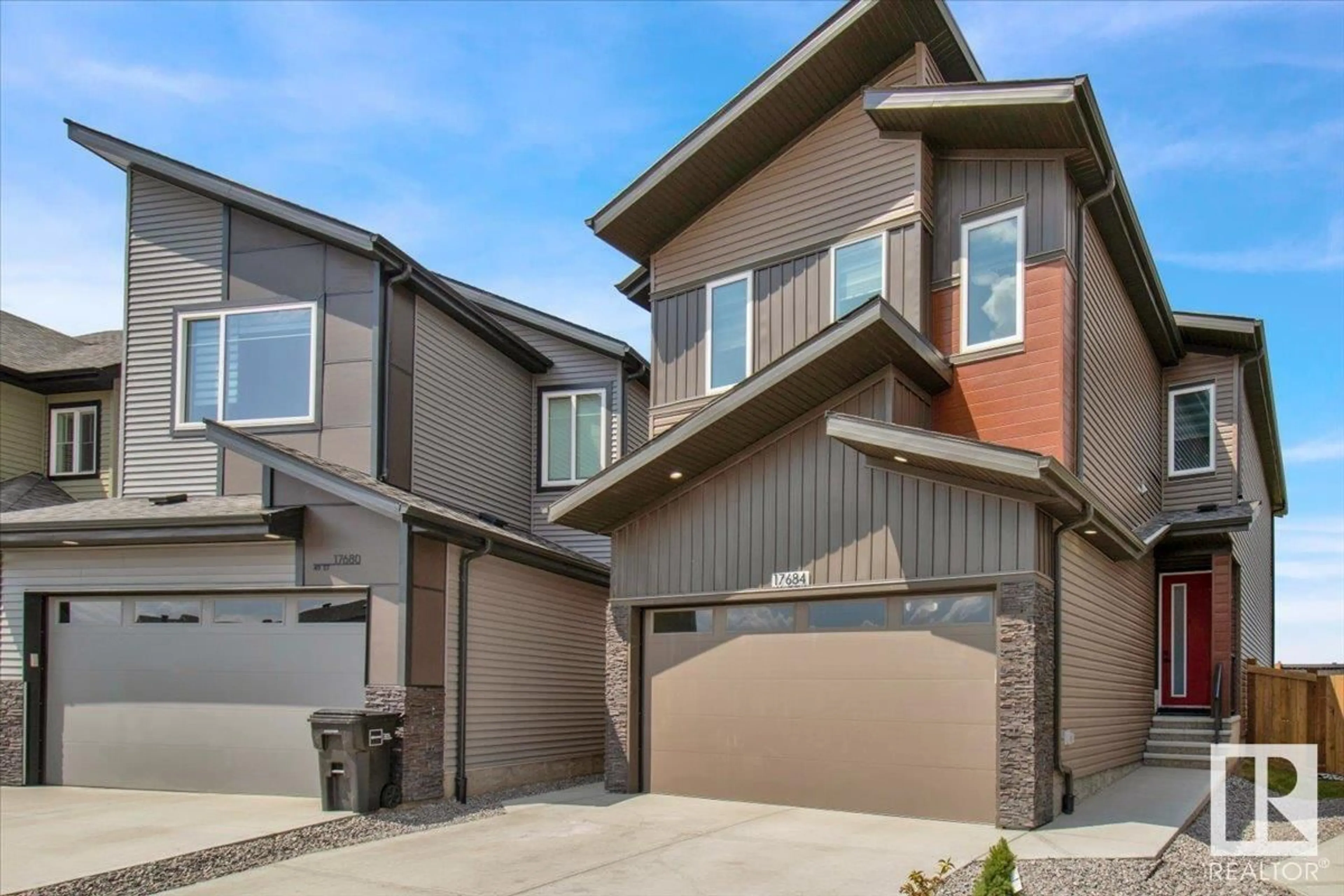 Home with vinyl exterior material, street for 17684 49 ST, Edmonton Alberta T5Y3Y1