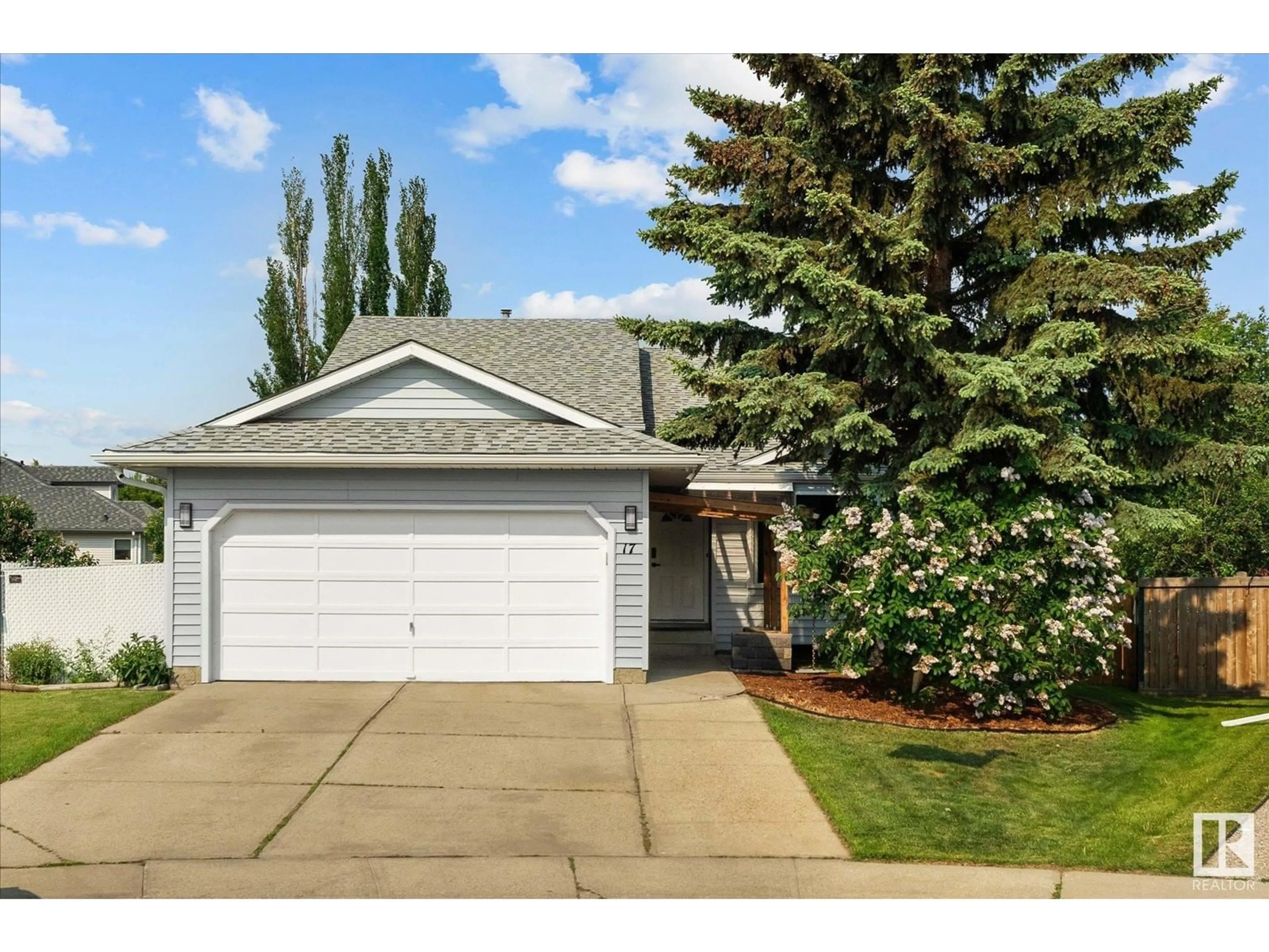 Home with vinyl exterior material, street for 17 GRASSVIEW CR, Spruce Grove Alberta T7X3H3